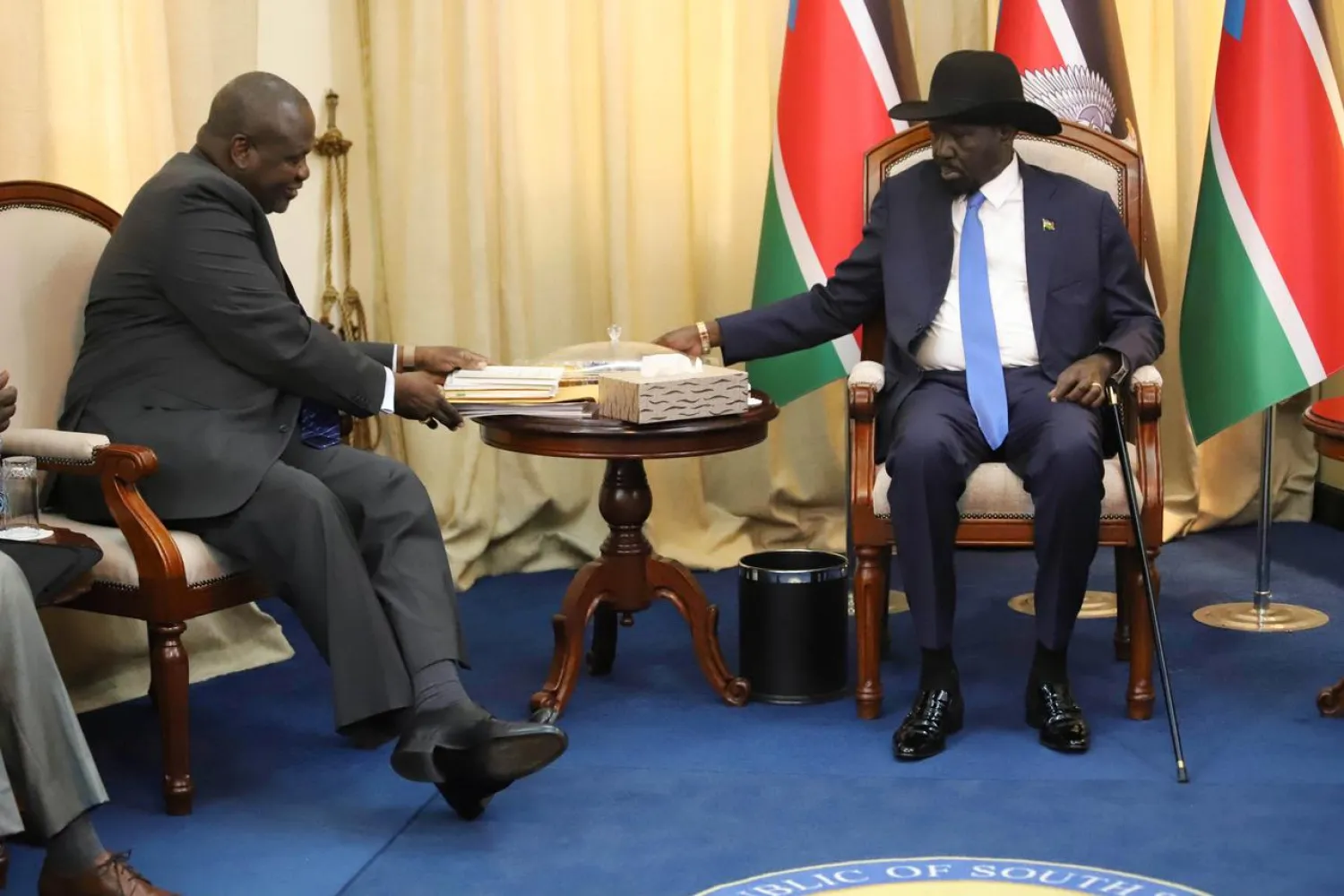 South Sudan's President Salva Kiir sits with ex-vice president and former rebel leader Riek Machar before their meeting in Juba, South Sudan, September 11, 2019. (Reuters)