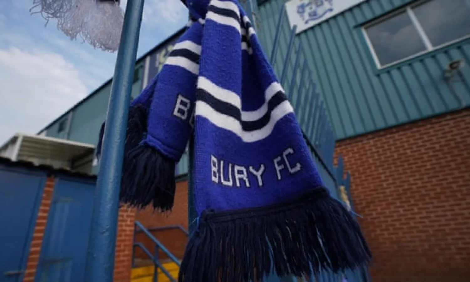  A scarf hanging at Bury’s Gigg Lane ground this week. Photograph: Jon Super/The Guardian
