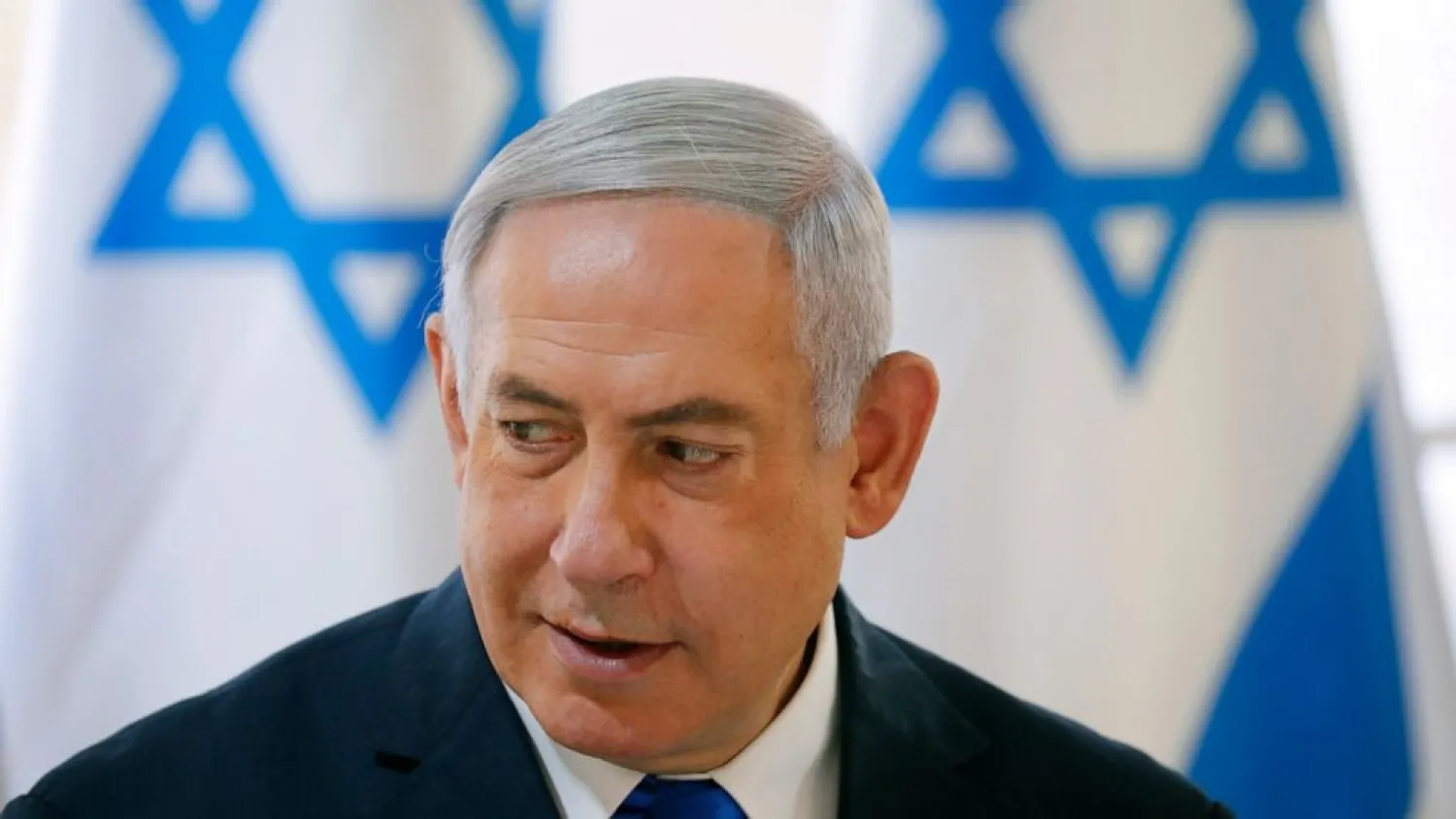 Israeli Prime Minister Benjamin Netanyahu chairs during the weekly cabinet meeting being held in the Jordan Valley, in the Israeli-occupied West Bank, Sunday, Sept. 15, 2019. (Amir Cohen/Pool via AP)