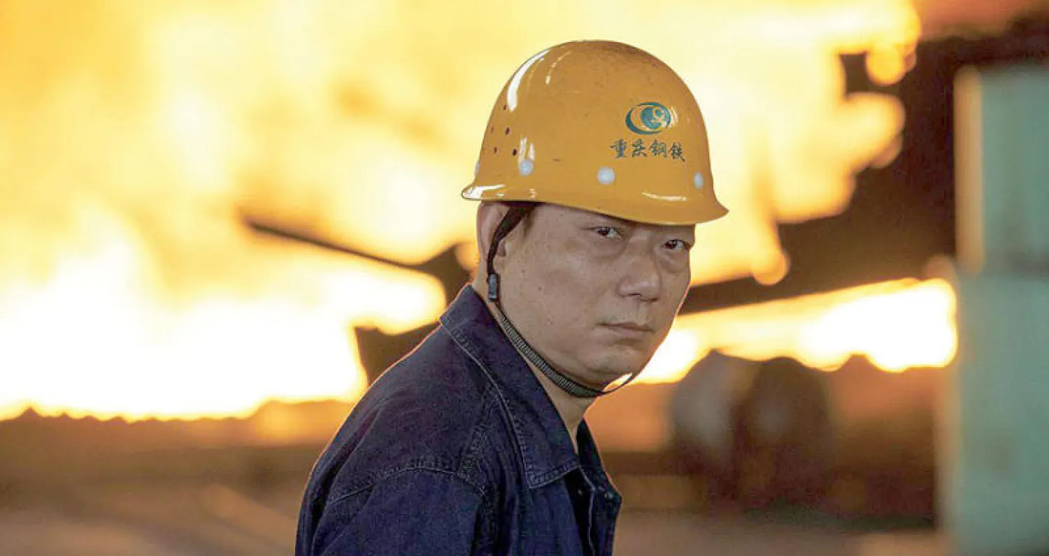 انخفض نمو الإنتاج الصناعي الصيني في أغسطس الماضي  إلى أدنى مستوى منذ 17 عاماً (رويترز)