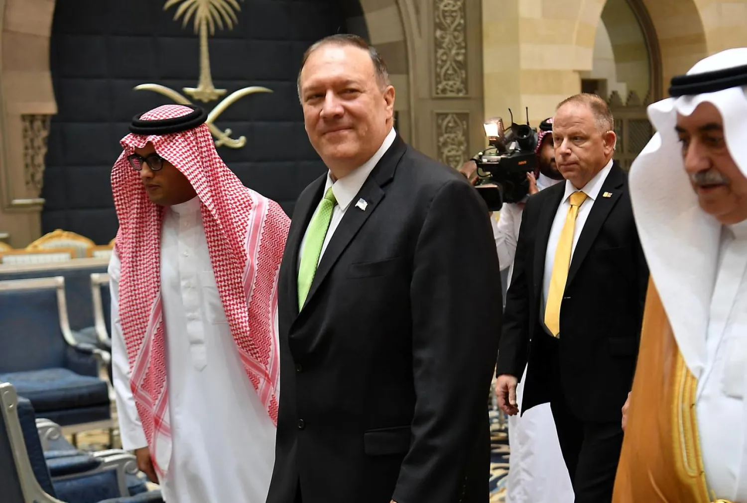 US Secretary of State Mike Pompeo walks after stepping off his plane upon arrival at King Abdulaziz International Airport in Jeddah, Saudi Arabia, September 18, 2019. (Reuters)