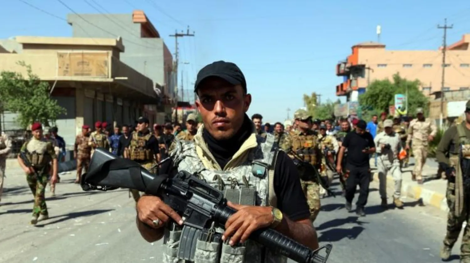 PMF members patrol an area in Tuz, southern Kirkuk city, Iraq, 17 October 2017. EPA file photo

