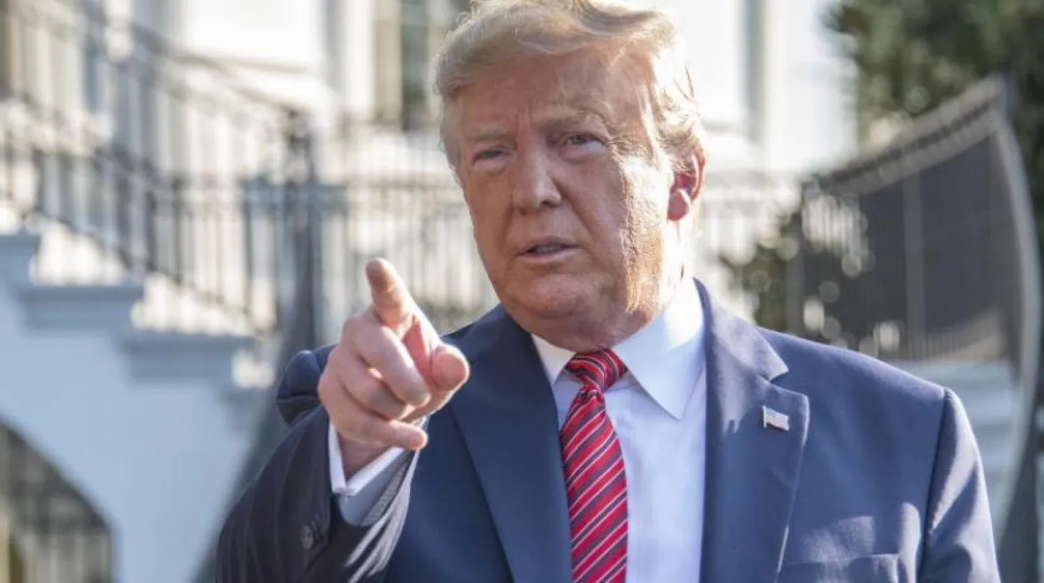US President Donald Trump speaks to reporters at the White House. EPA photo