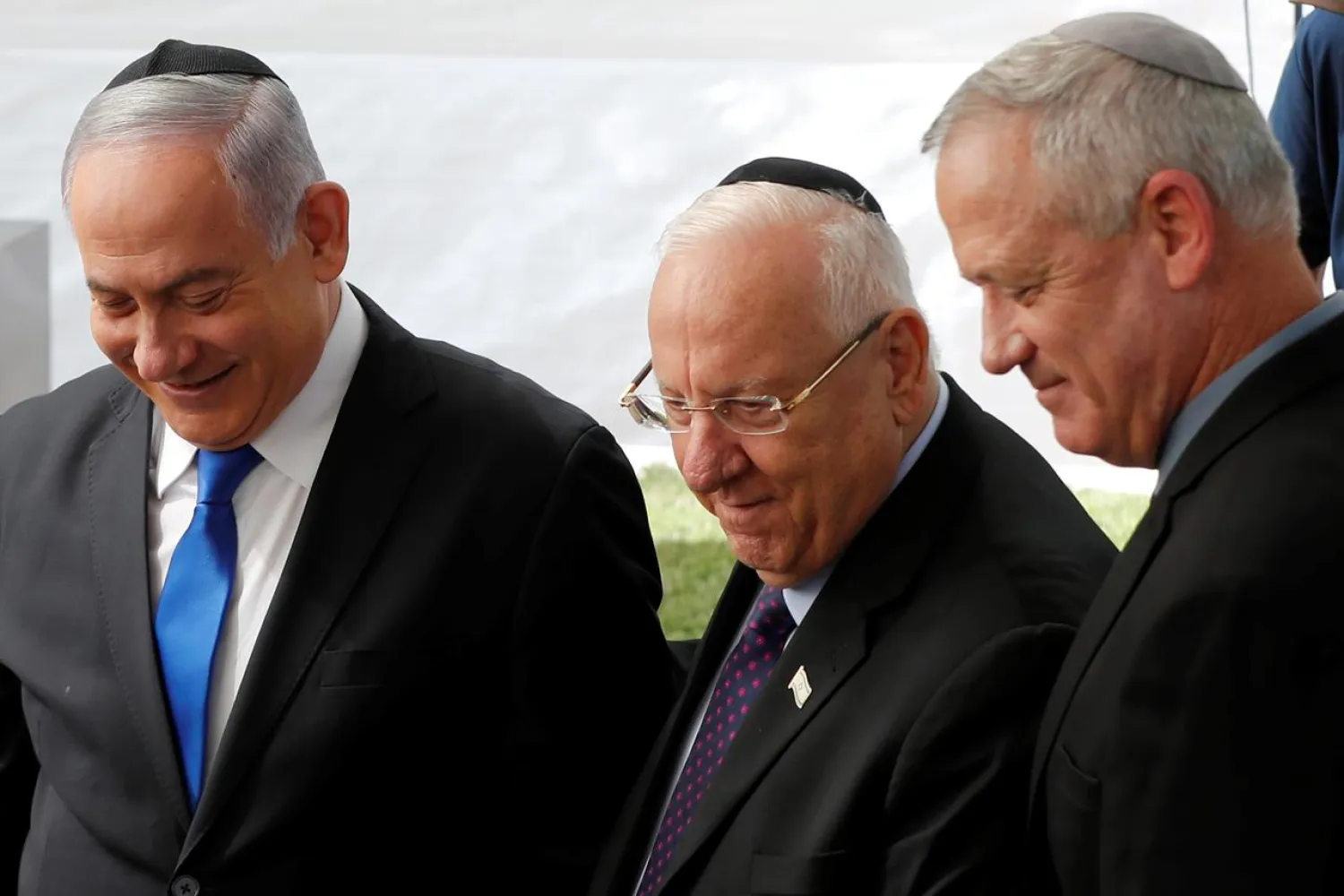 Israeli PM Benjamin Netanyahu, President Reuven Rivlin and Benny Gantz of the Blue and White party at the memorial for late President Shimon Peres in Jerusalem, September 22, 2019. (Reuters)