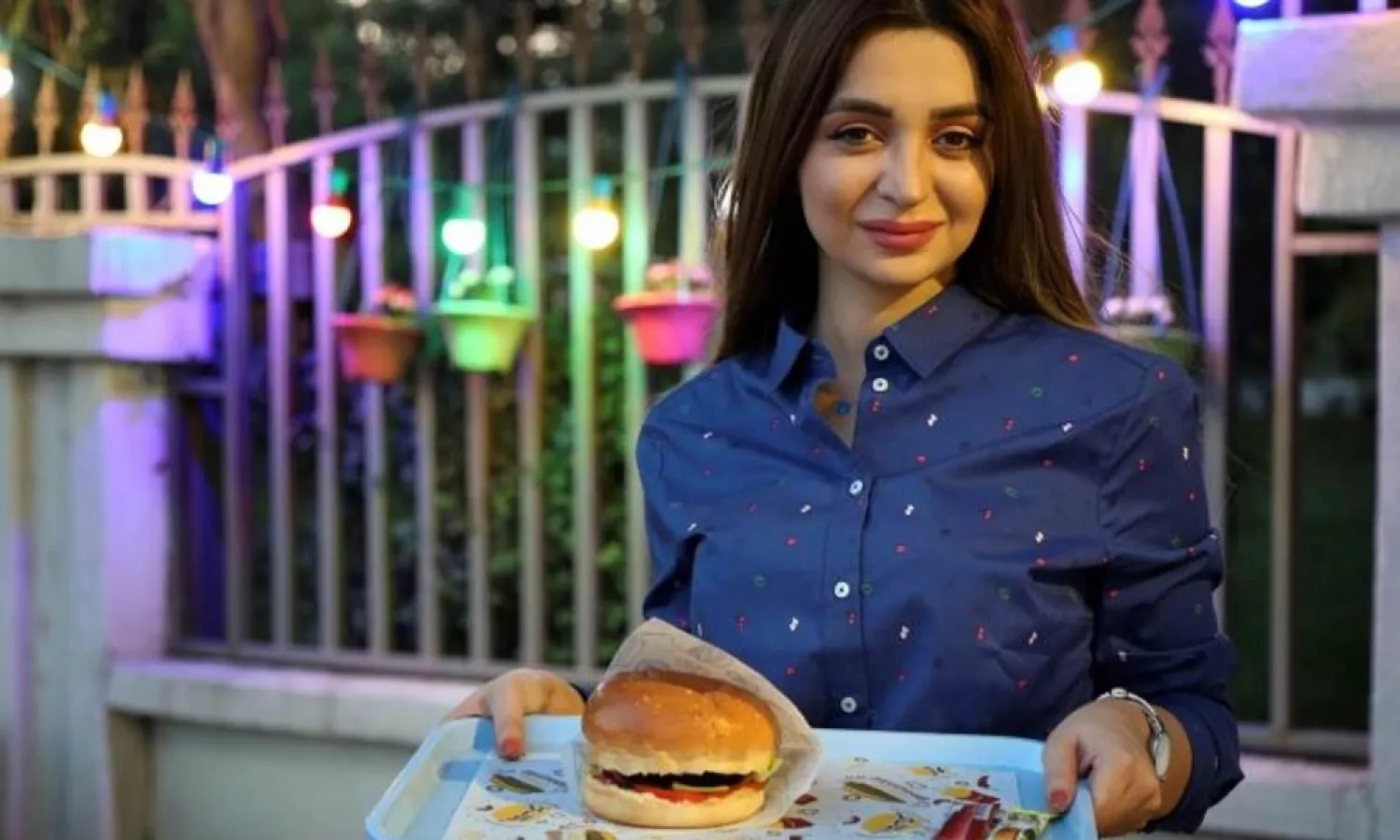 Zilan Serwud, 22, needed family approval before opening her food truck selling burgers in Iraqi Kurdistan. (AFP)