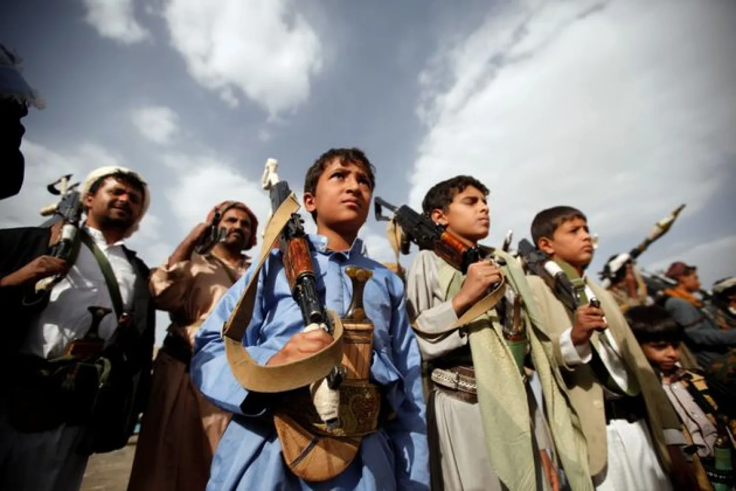 Boys attend a pro-Houthi tribal gathering in Sanaa, Yemen (Reuters)