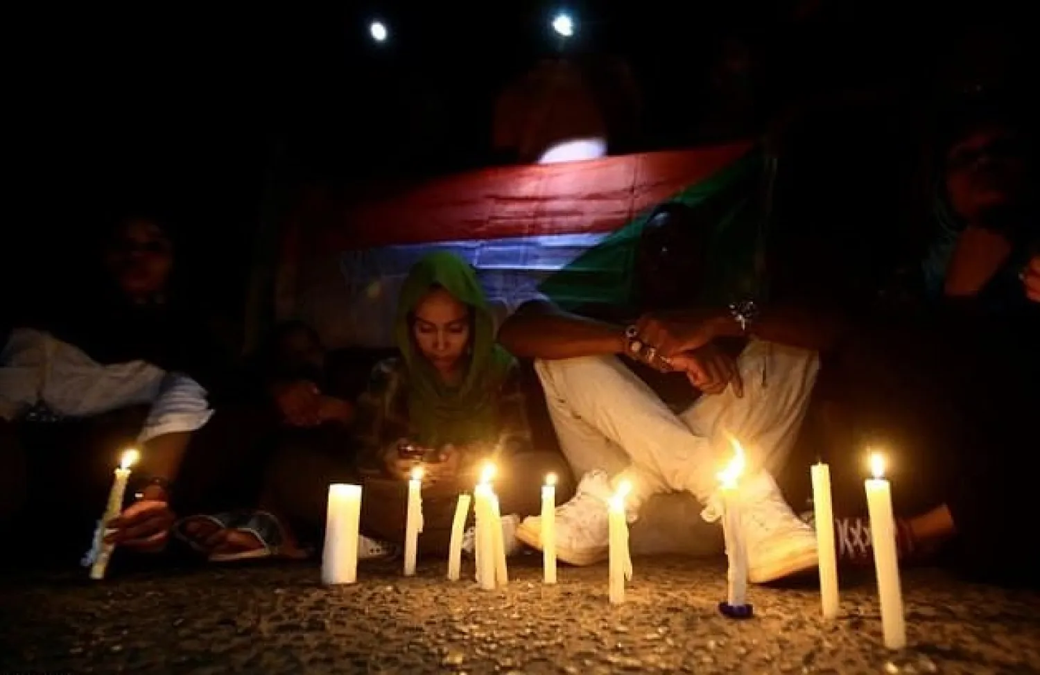 Sudanese protesters have held regular vigils to remember those killed in the June crackdown on a long-running sit-in outside army headquarters in Khartoum. AFP

