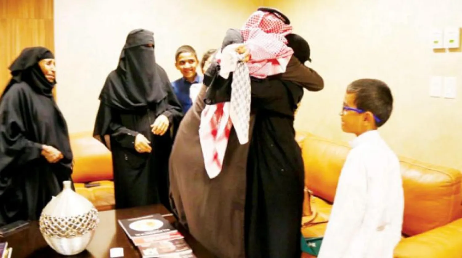 Nasser Al-Tharawi reunited with his family in Saudi Arabia, Asharq Al-Awsat 
