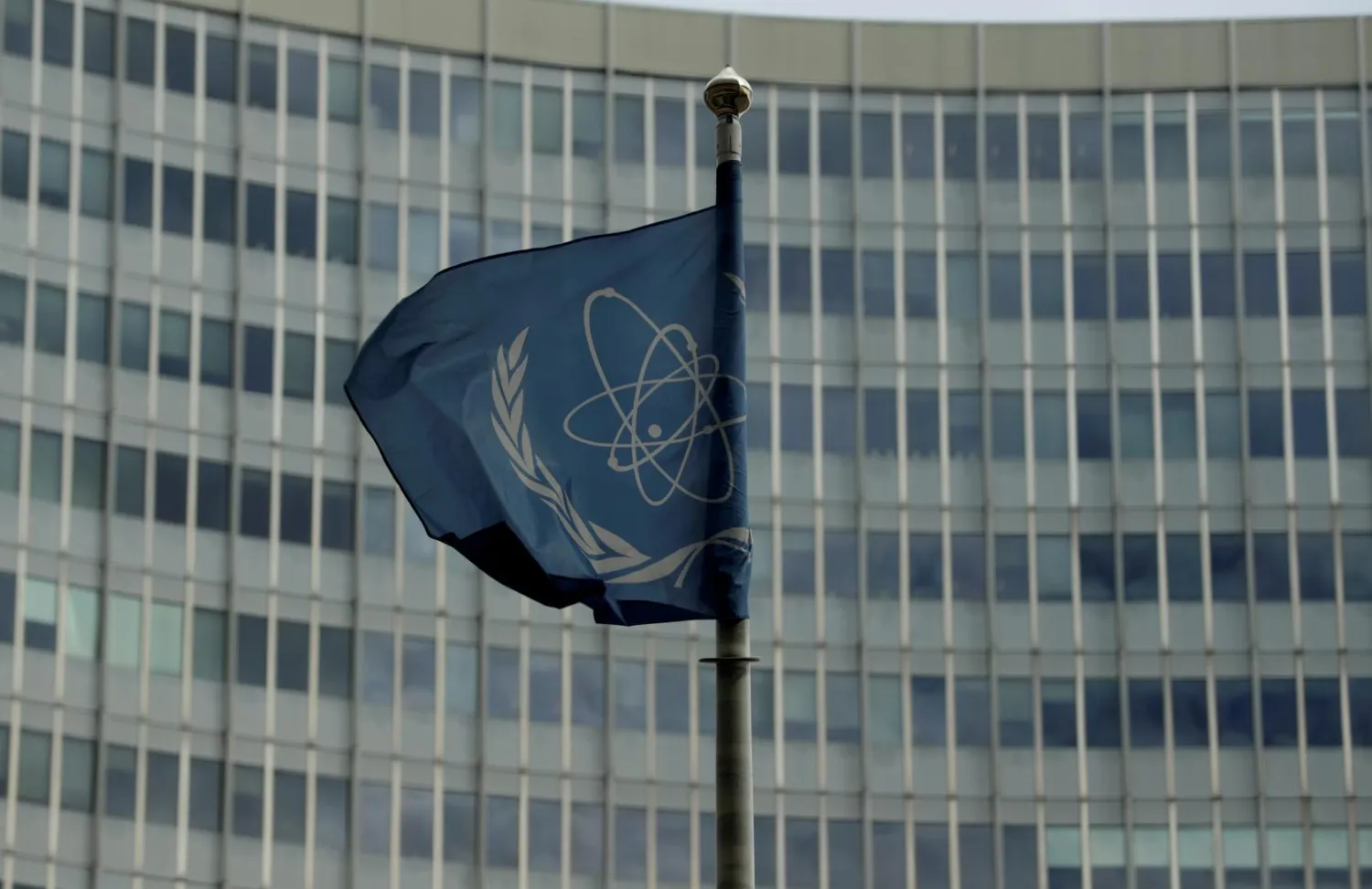 The flag of the International Atomic Energy Agency (IAEA) flutters in front of its headquarters in Vienna, Austria September 9, 2019. REUTERS/Leonhard Foeger