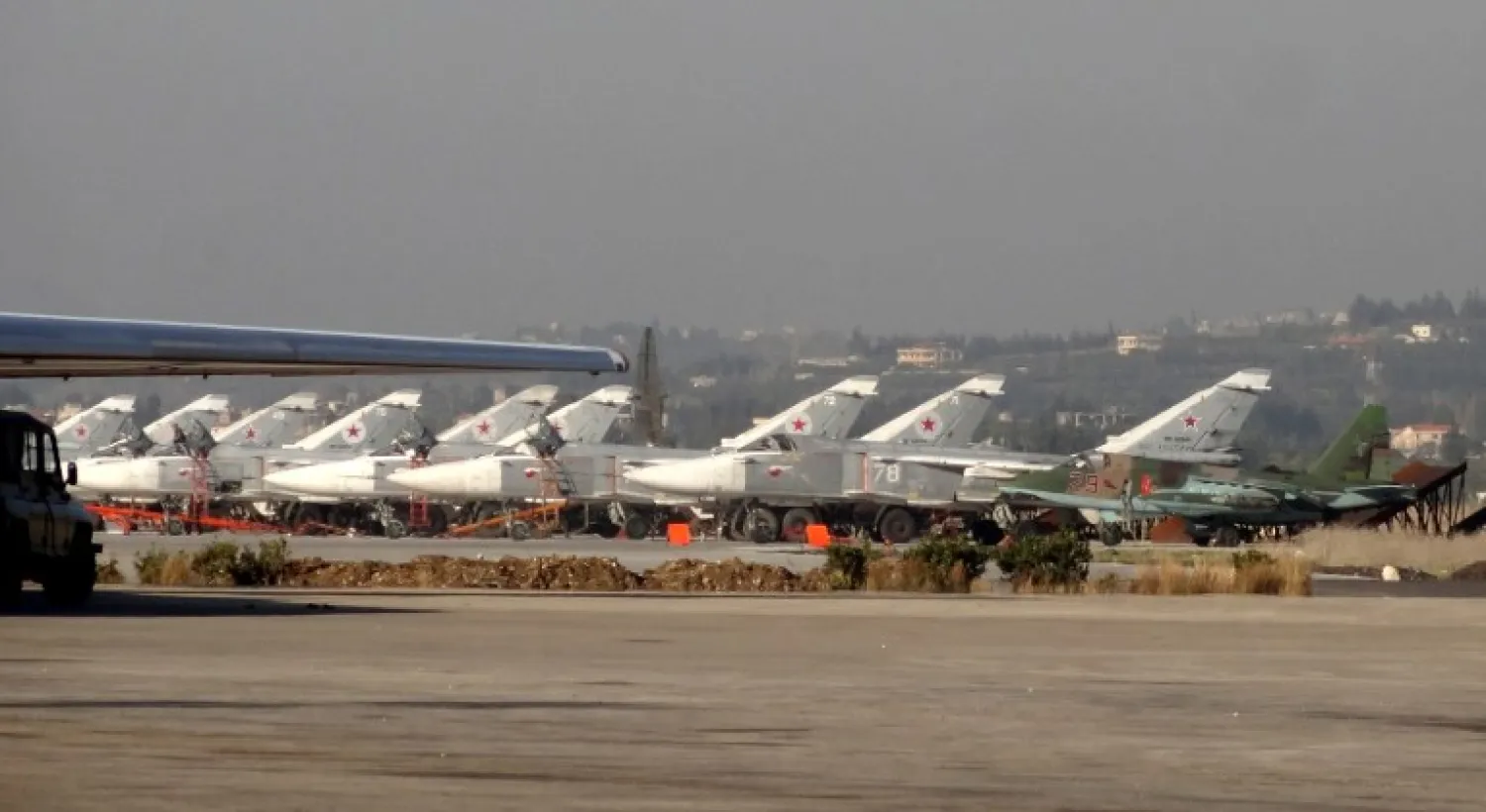 Russian fighter jets on the tarmac at the Russian Hmeimim military base in Latakia province, in the northwest of Syria, February 16, 2016. (AFP/STRINGER)