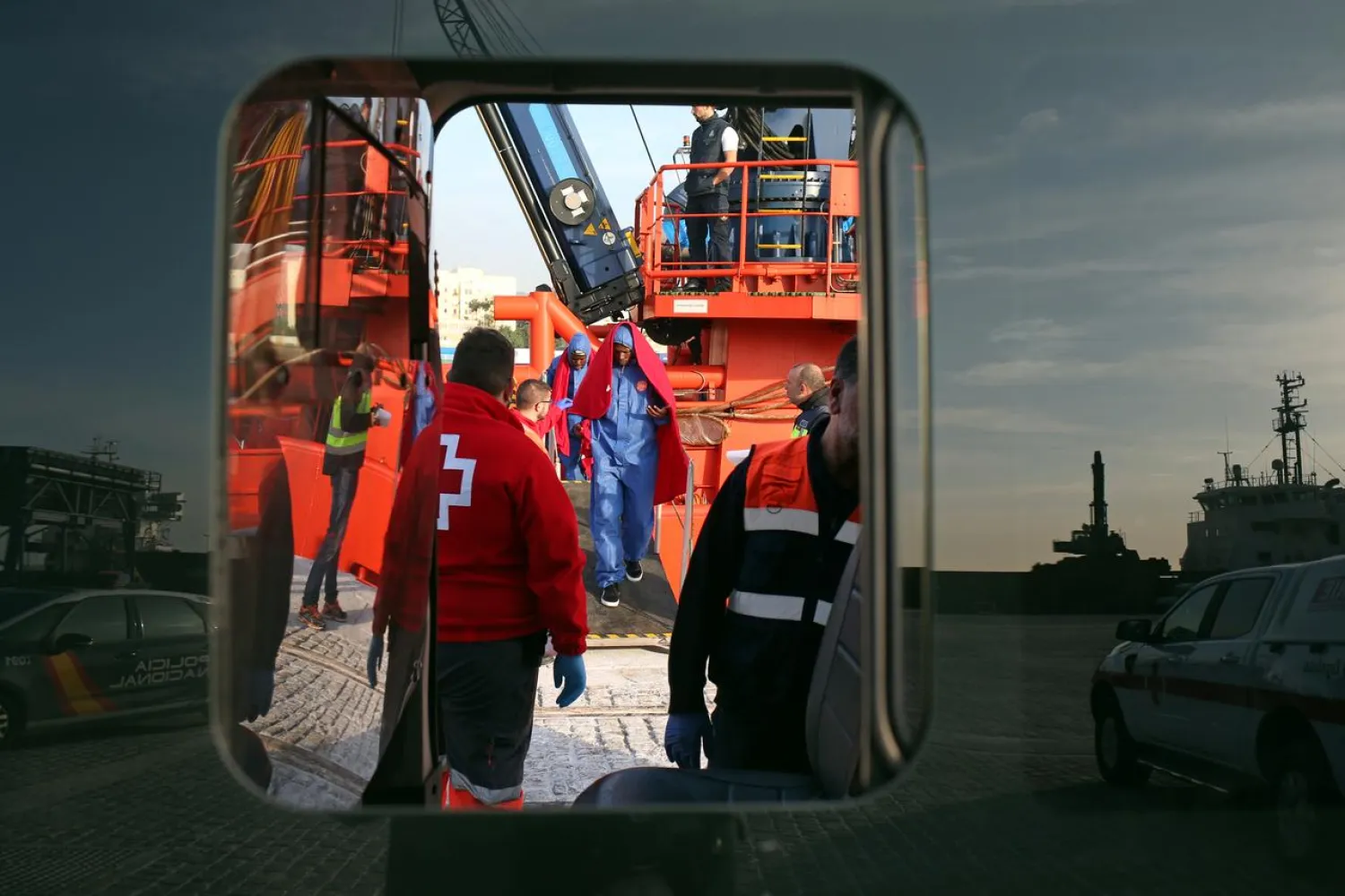 Migrants, intercepted off the coast in the Mediterranean Sea, disembark from a rescue boat at the port of Malaga, southern Spain, November 13, 2018. (Reuters)