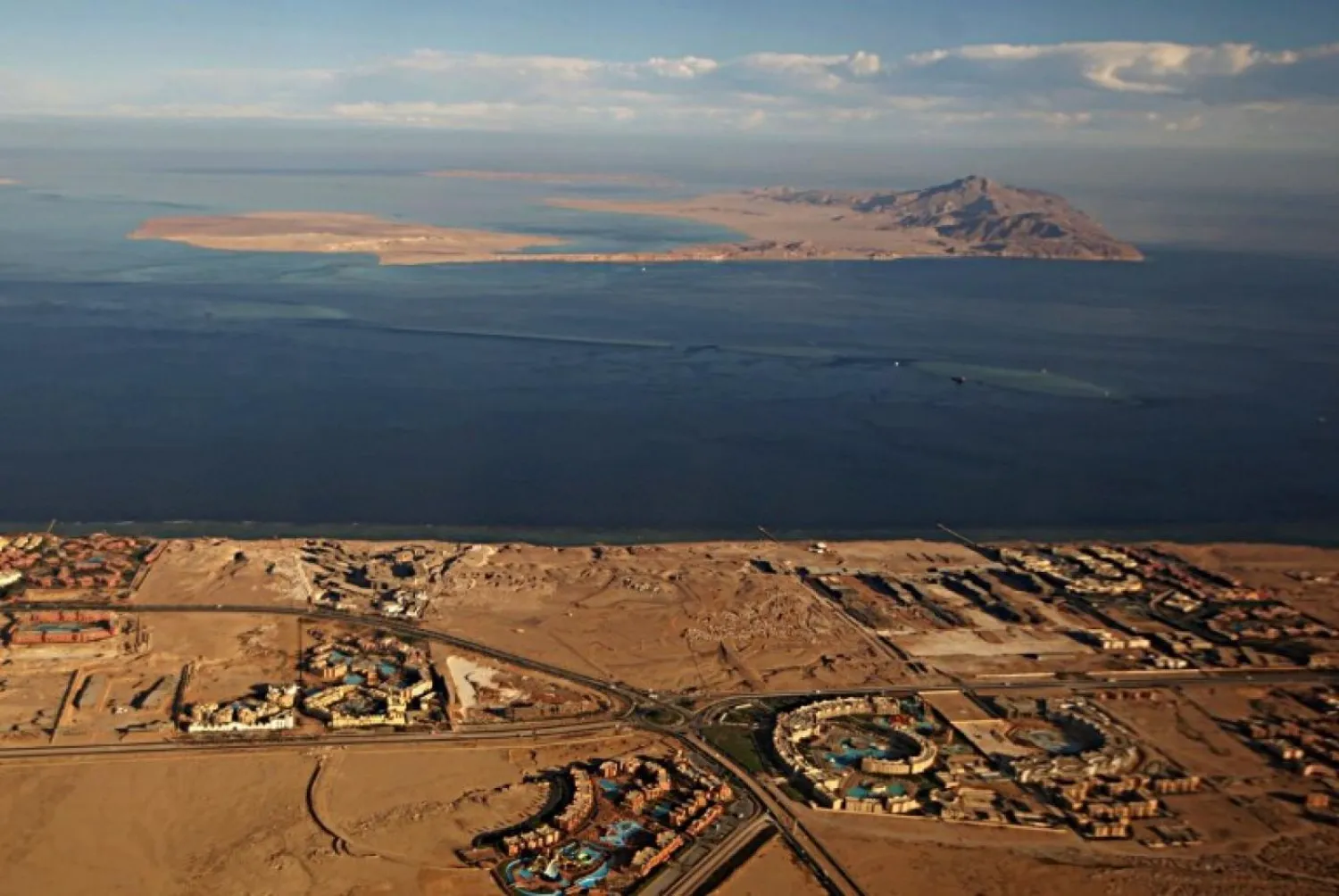 An aerial view of the Red Sea islands of Tiran, in the foreground, and Sanafir (AFP)