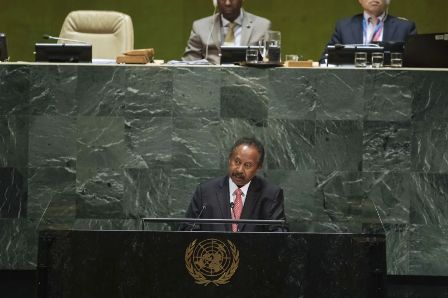 Sudan's Prime Minister Abdalla Hamdok addresses the 74th session of the United Nations General Assembly at the UN headquarters Friday, Sept. 27, 2019. (AP Photo/Kevin Hagen)