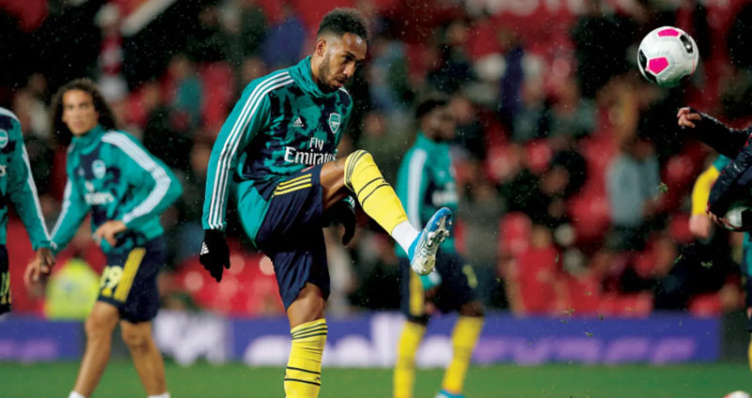 أوباميانغ نجم آرسنال أصبح أهم أوراق فريقه الهجومية قبل مواجهة أبويل (إ.ب.أ)