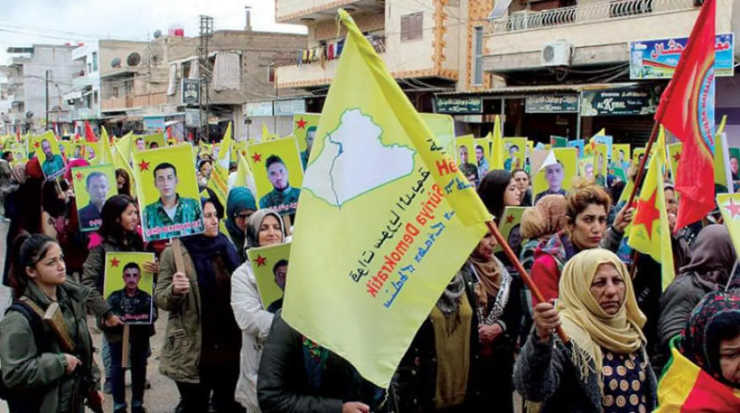 Protests in front of UN headquarters in Qamishli, north Syria (Asharq Al-Awsat)
