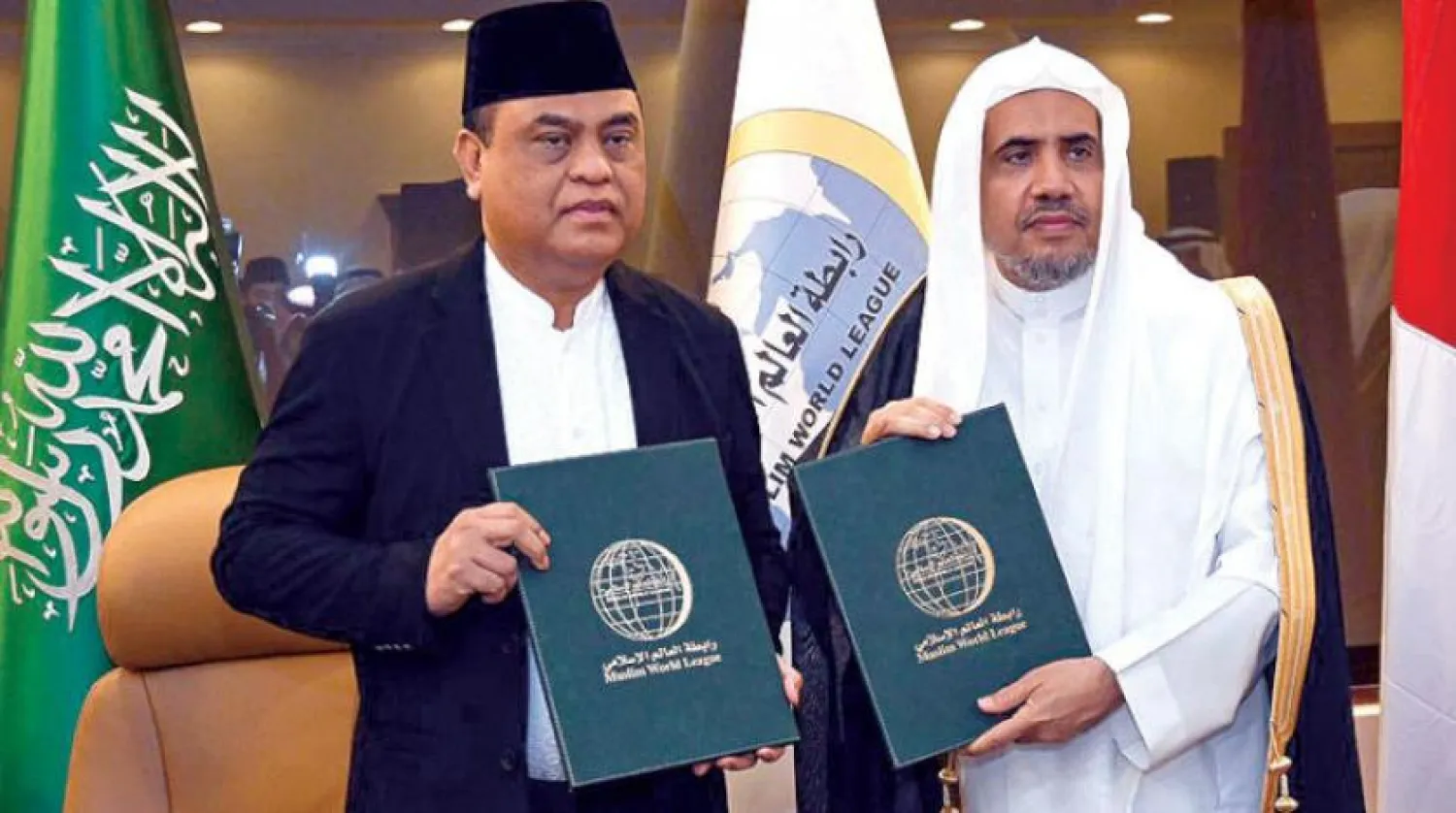 Muslim World League Secretary-General Sheikh Mohammed Al-Essa and Indonesia’s Minister of Civil Service and Reform Dr. Safaruddin Campo at the signing ceremony of the agreement in Jeddah, Asharq Al-Awsat  (Arabic Website) 