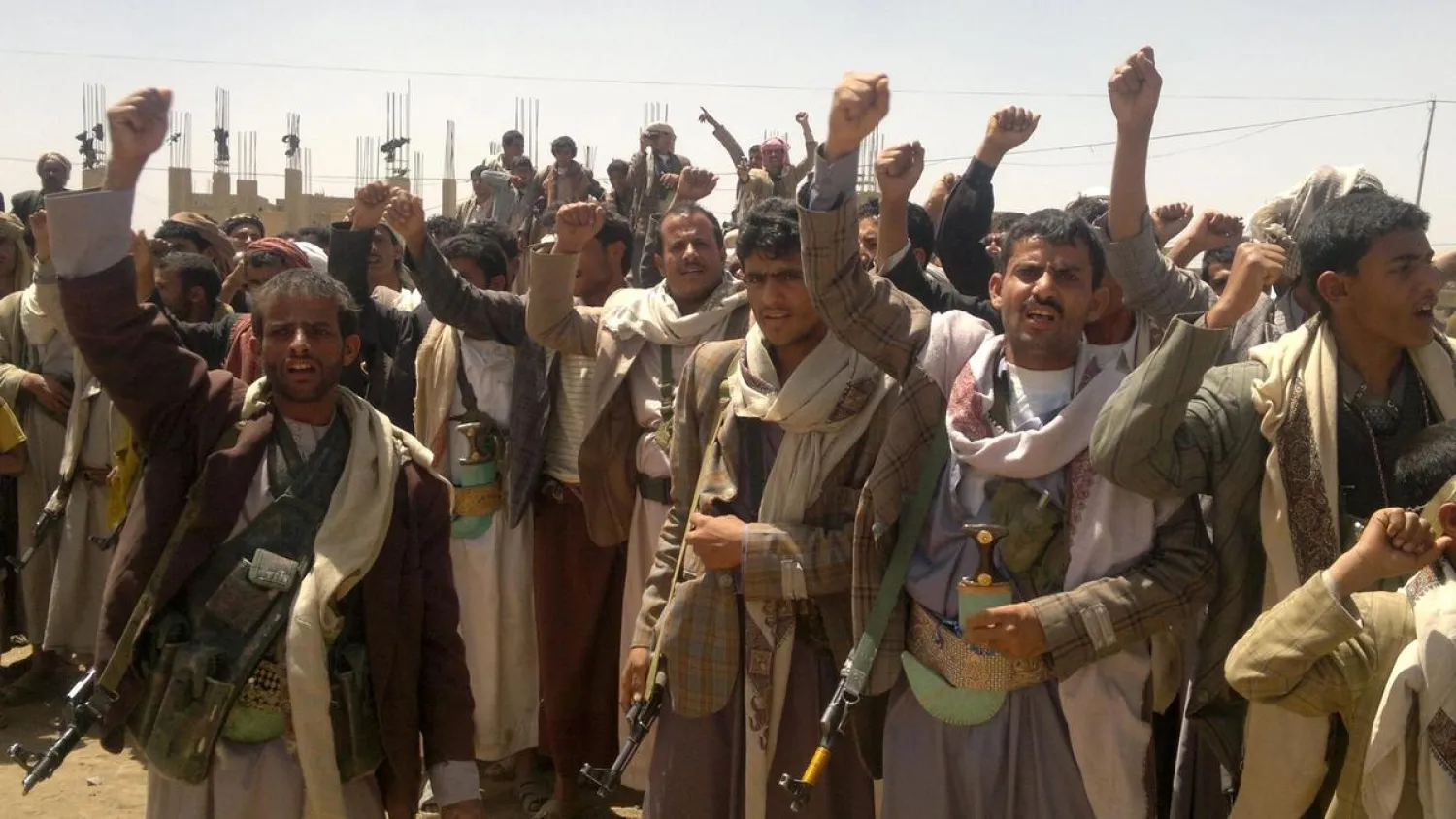 Houthi chant slogans in the city of Amran, north of Sanaa. (File Photo: AFP)
