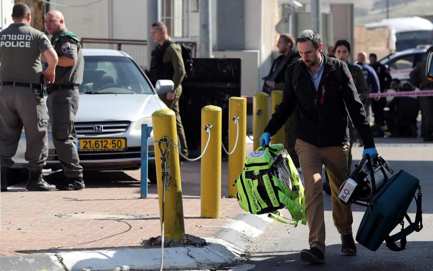 A medic is seen at the scene of an incident at an Israeli checkpoint, east of Jerusalem January 30, 2019. REUTERS/Ammar Awad
