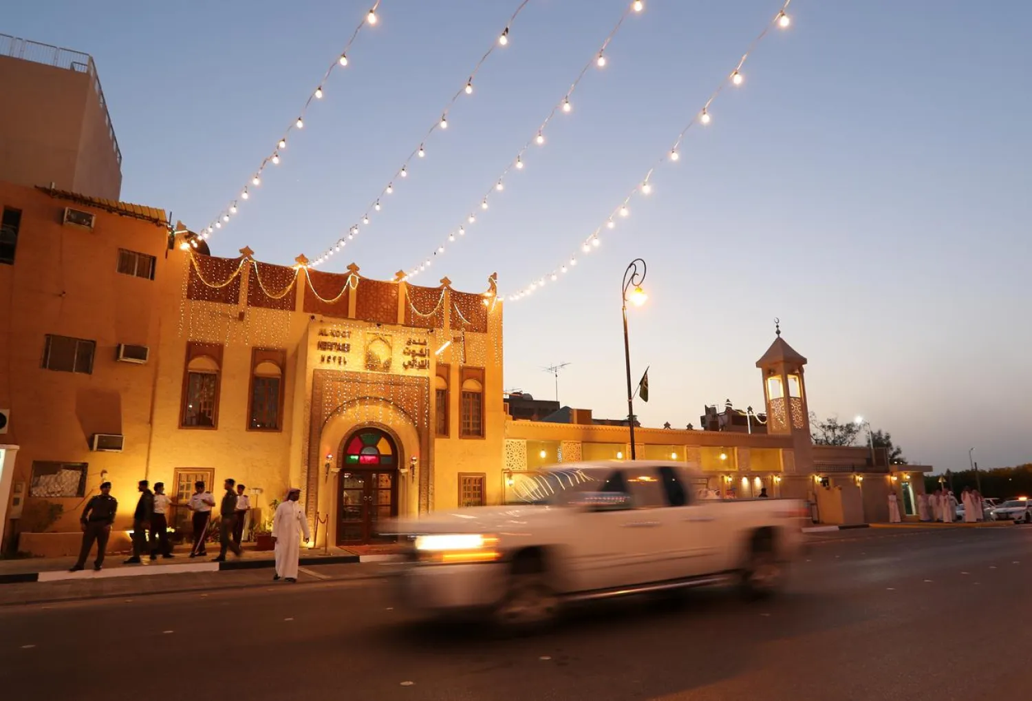 A car passes in front of the main entrance of Al Koot Heritage Hotel in Al Ahsa, Saudi Arabia, July 8, 2018. (Reuters)