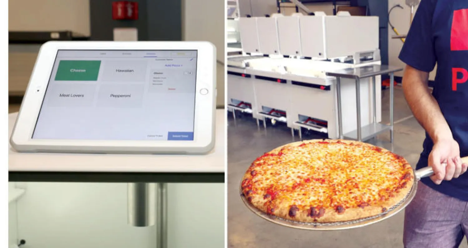 تكمل البيتزا رحلتها عبر خط التجميع الآلي في غضون دقيقة وبضع ثوانٍ (خدمات تريبيون ميديا)  -  اختيار المكونات عن طريق التطبيق على «الآيباد» (خدمات تريبيون ميديا)