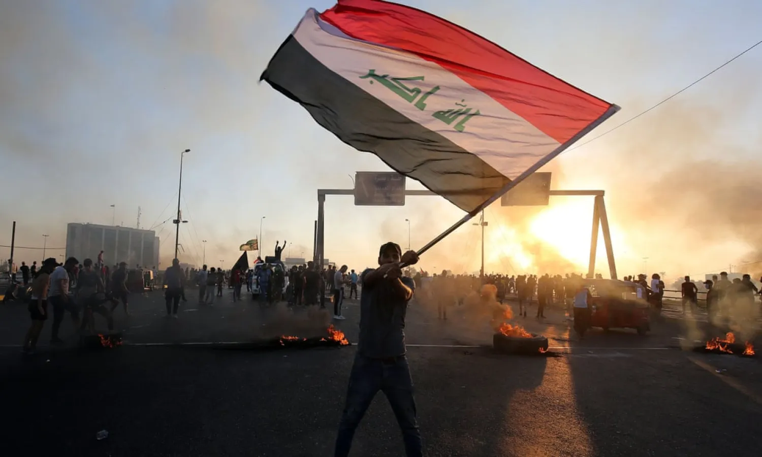 The Iraqi government has announced a series of reforms in the hopes of quelling anti-government protests in which more than 100 have been killed | AFP