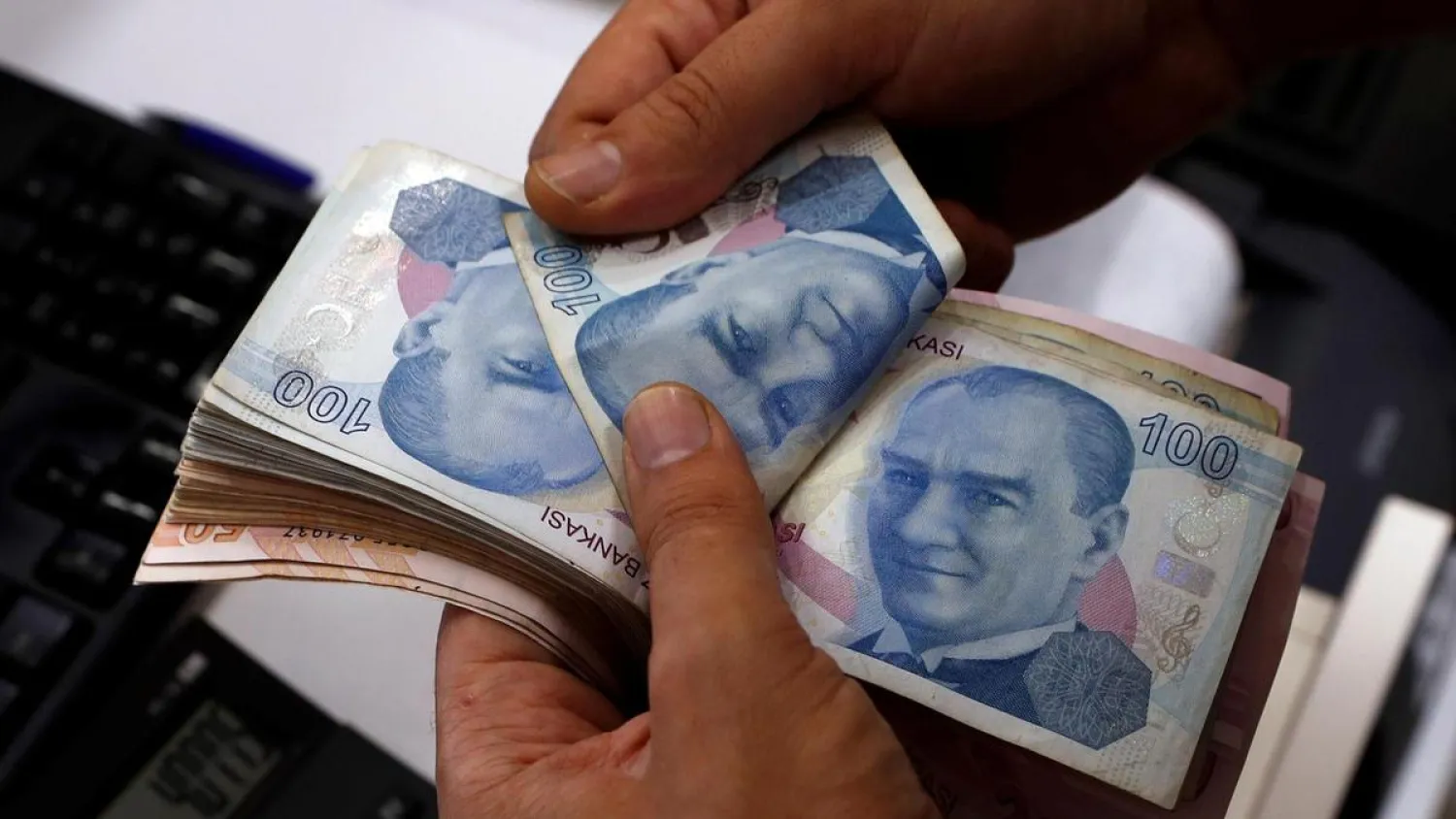 Turkey’s lira slid against the dollar after the White House said Ankara will soon be moving forward with its operation into northern Syria. (Reuters)