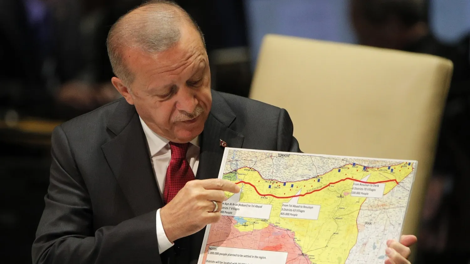 Turkey's President Recep Tayyip Erdogan holds up a map as he addresses the 74th session of the UN General Assembly at UN headquarters in New York City, New York, US, Sept. 24, 2019. (Reuters)