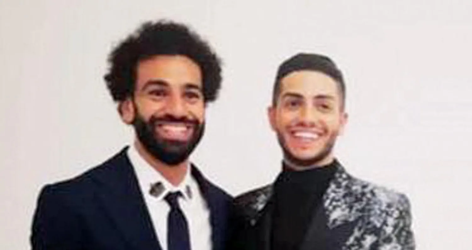 محمد صلاح مع الفنان مينا مسعود في الحفل