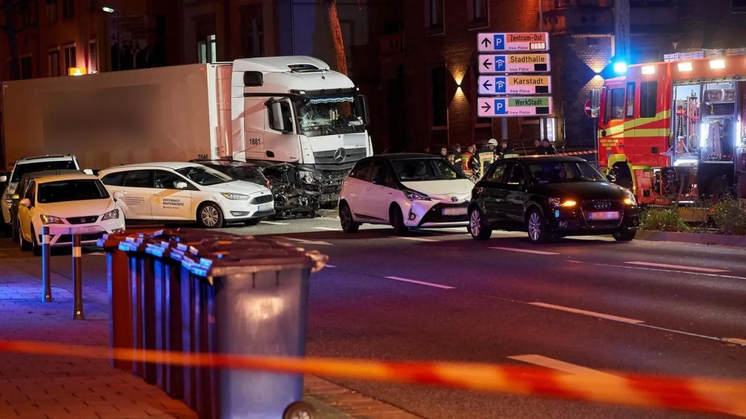 Picture shows the scene, codoned off by police, where a stolen truck crashed in to cars stopped at a red light in Limburg, western Germany, on October 7, 2019. (AFP)