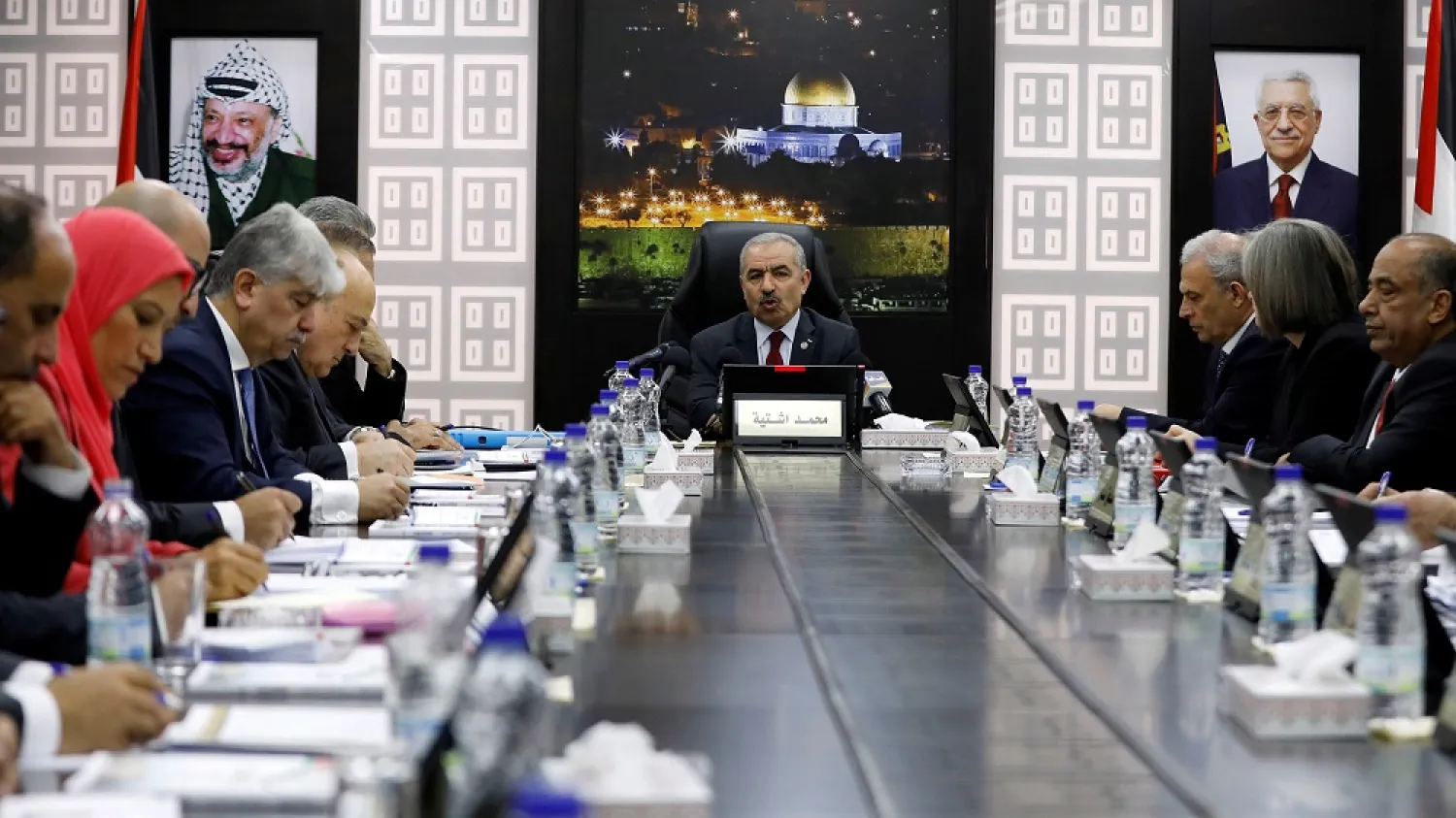 Prime Minister Mohammad Shtayyeh speaks during a cabinet meeting of the new Palestinian government, Ramallah, the Israeli-occupied West Bank, April 15, 2019. (Reuters)