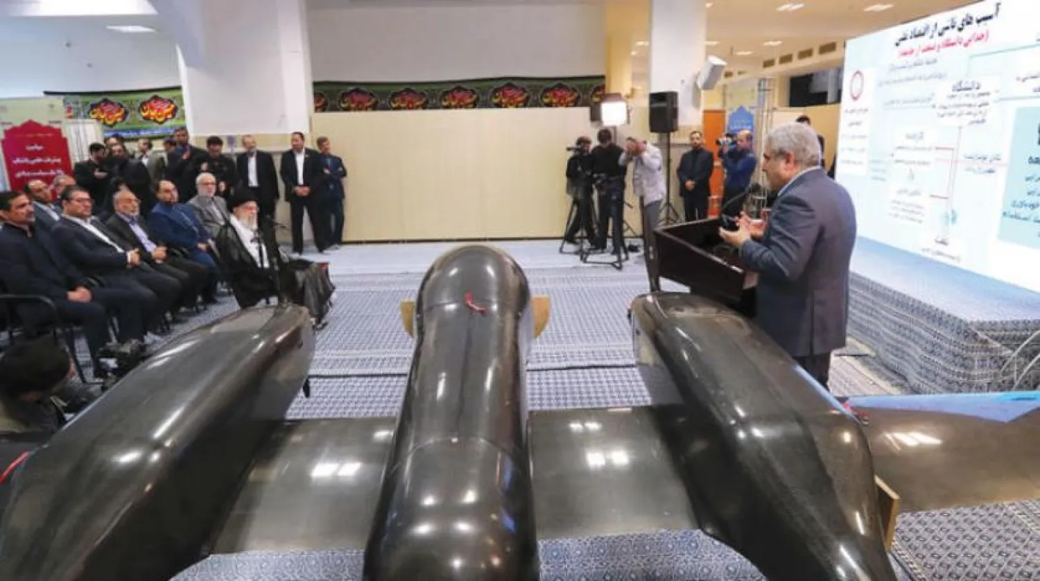 Iran's Supreme Leader Ali Khamenei standing in front of an Iranian drone during the Tehran Technology Expo on Tuesday (Khamenei website)
