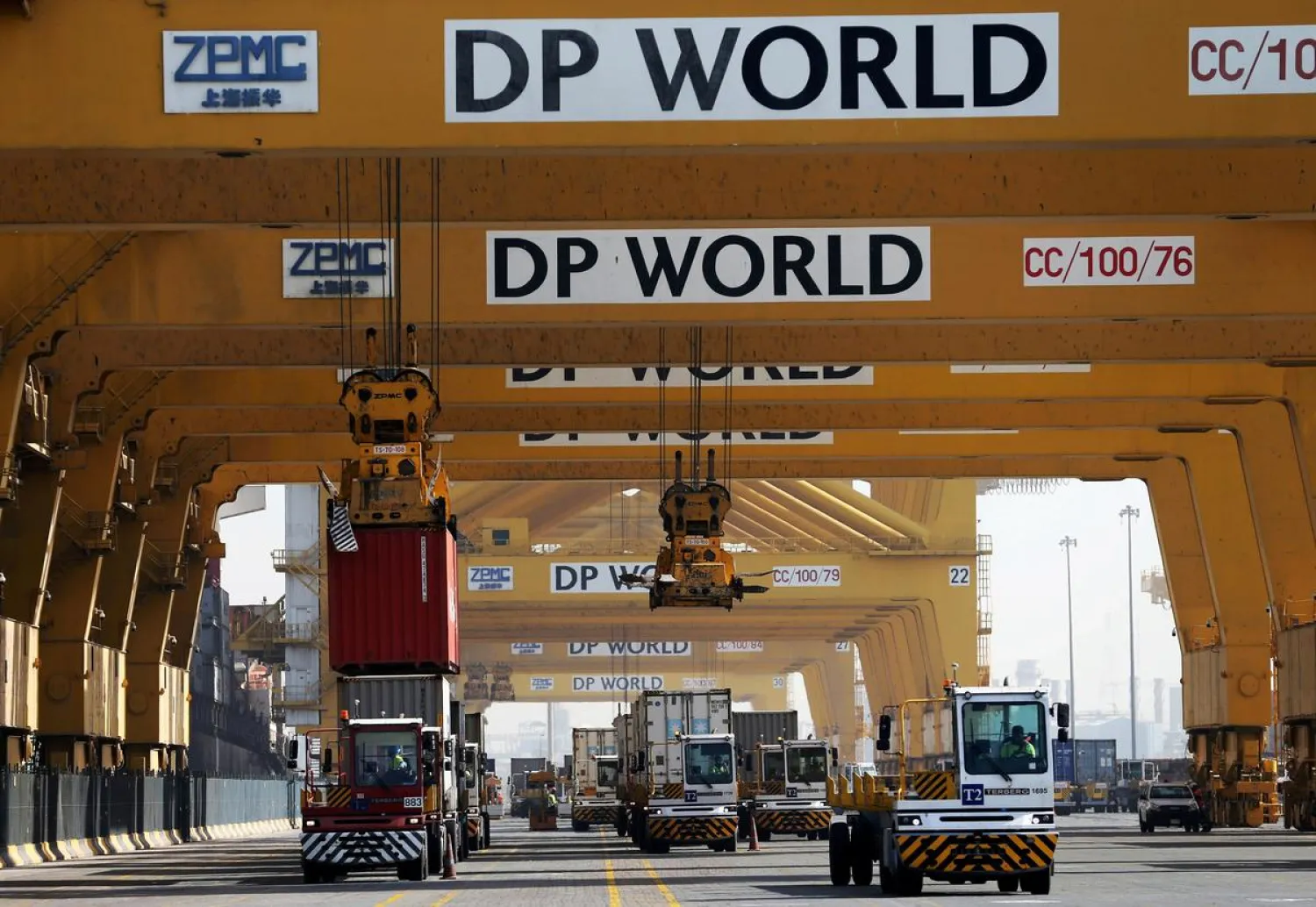 Terminal tractors line up to offload their containers into a cargo ship at DP World's fully automated Terminal 2 at Jebel Ali Port in Dubai, United Arab Emirates, December 27, 2018. REUTERS/ Hamad I Mohammed
