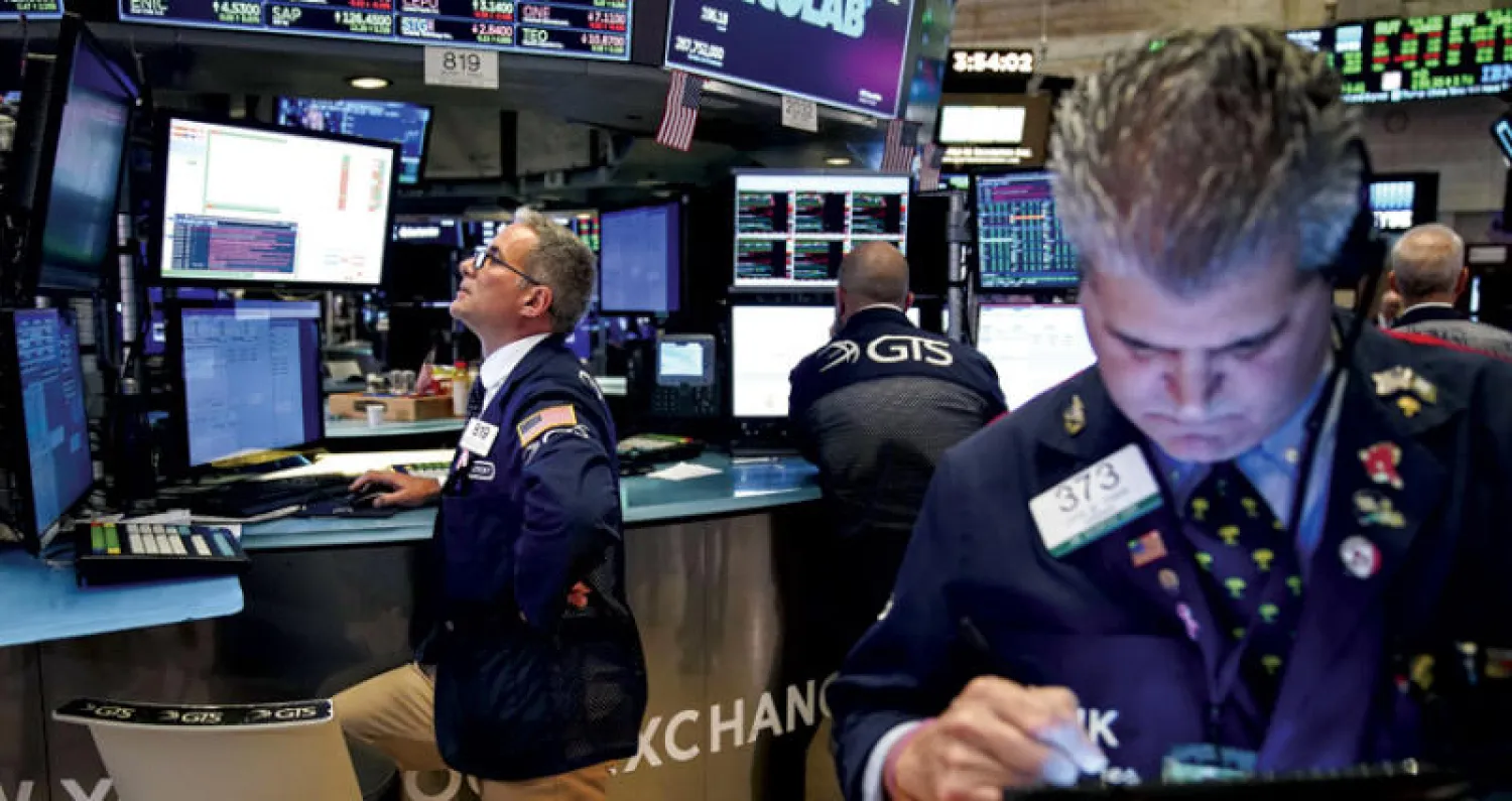 تأرجحت الأسواق العالمية خلال الأسبوع الماضي مع مراوحة النزاع التجاري بين التصعيد والحلحلة (أ.ف.ب)