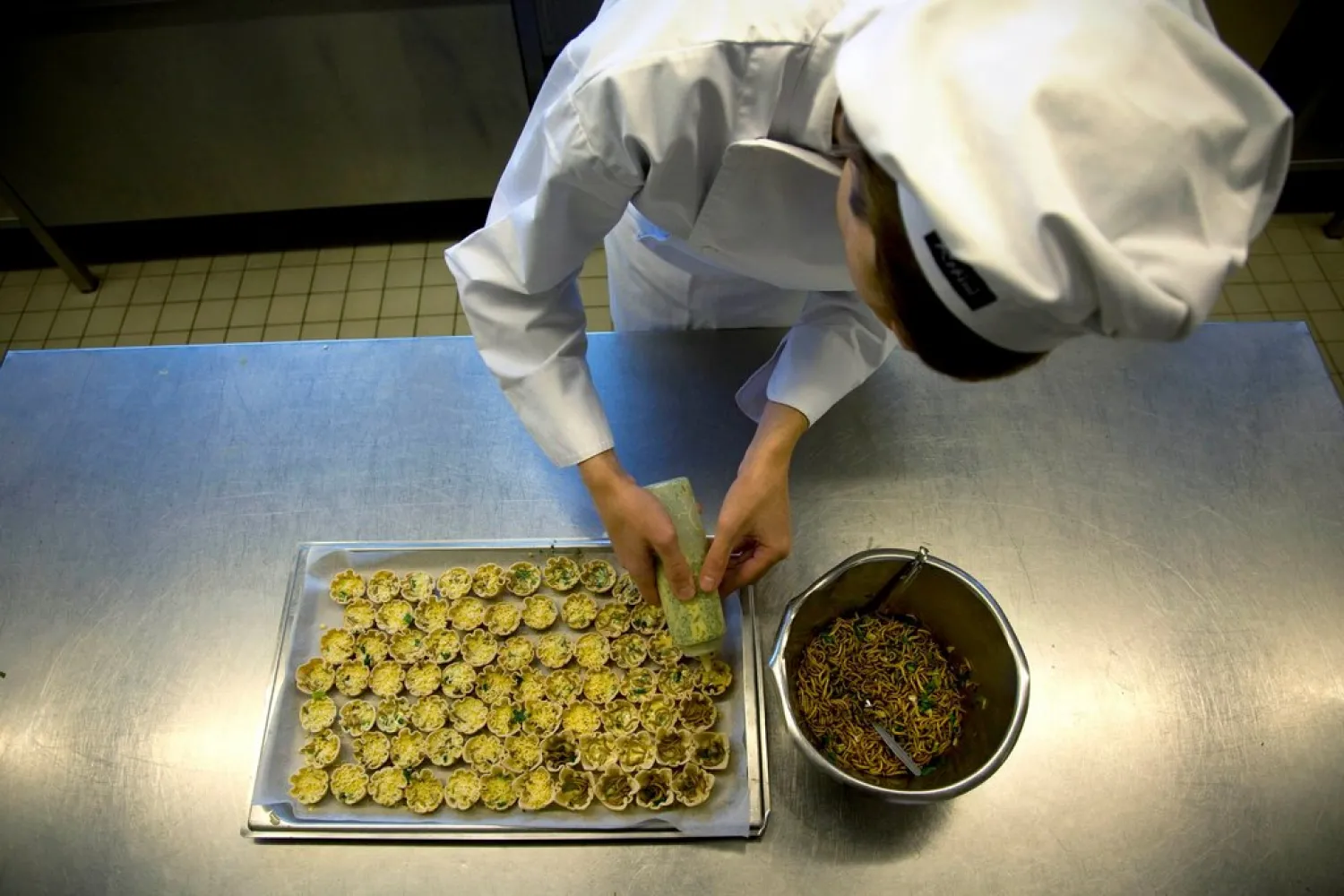A culinary student preparing mealworm quiches at the Rijn Ijssel chefs school in Wageningen, Netherlands.CreditCreditJerry Lampen/Reuters
