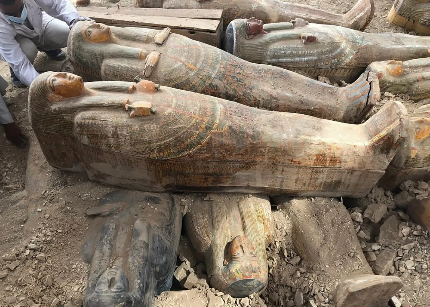 This photo provided by the Egyptian Ministry of Antiquities shows recently discovered ancient colored coffins in the southern city of Luxor, Egypt, Tuesday, Oct. 15, 2019. (AP)