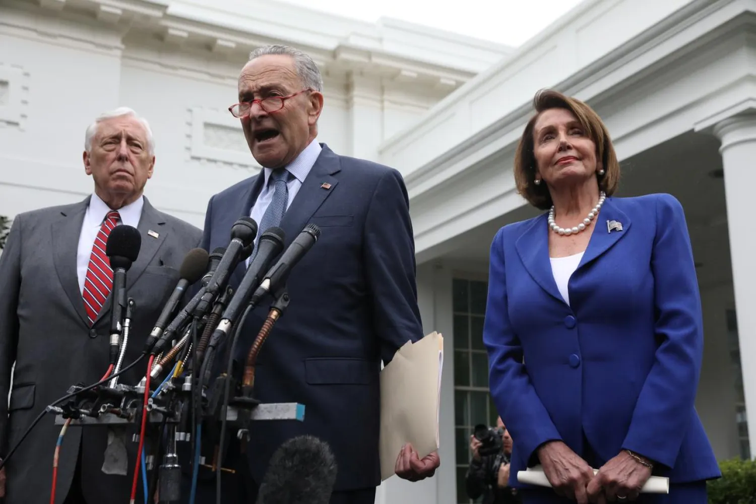 US Senate Minority Leader Chuck Schumer (D-NY) speaks to reporters with House Majority Leader Steny Hoyer (D-MD) and House Speaker Nancy Pelosi (D-CA) after meeting with US President Donald Trump at the White House in Washington, US, October 16, 2019. REUTERS/Leah Millis