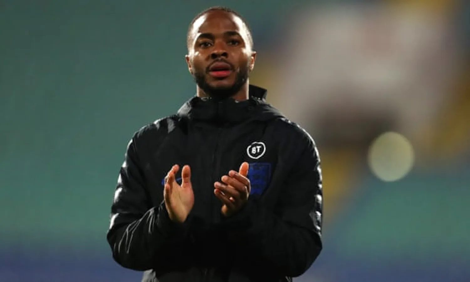  Raheem Sterling applauds England fans after the game in Sofia. Photograph: Catherine Ivill/Getty Images
