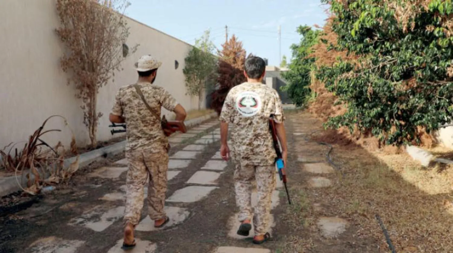  Two pro-Sarraj fighters south of Tripoli (Reuters)