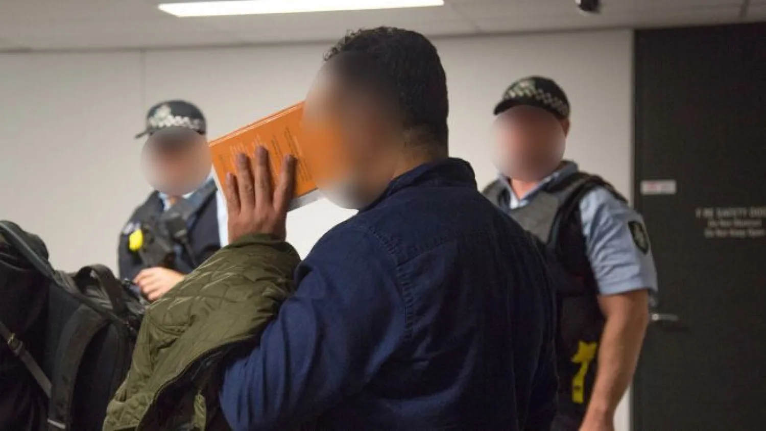 Maythem Radhi during his arrest at Brisbane airport