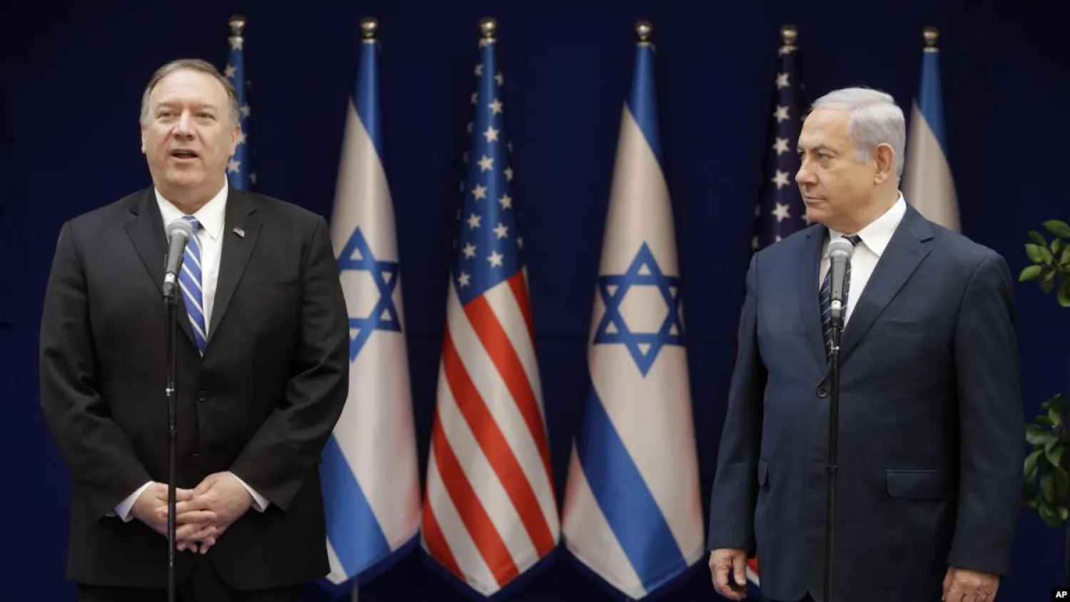 US Secretary of State Mike Pompeo, left, and Israeli Prime Minister, Benjamin Netanyahu, stand during statements to the press during a meeting at the Prime Minister's residence in Jerusalem, Friday, Oct. 18, 2019. (AP Photo/Sebastian Scheiner, Pool)