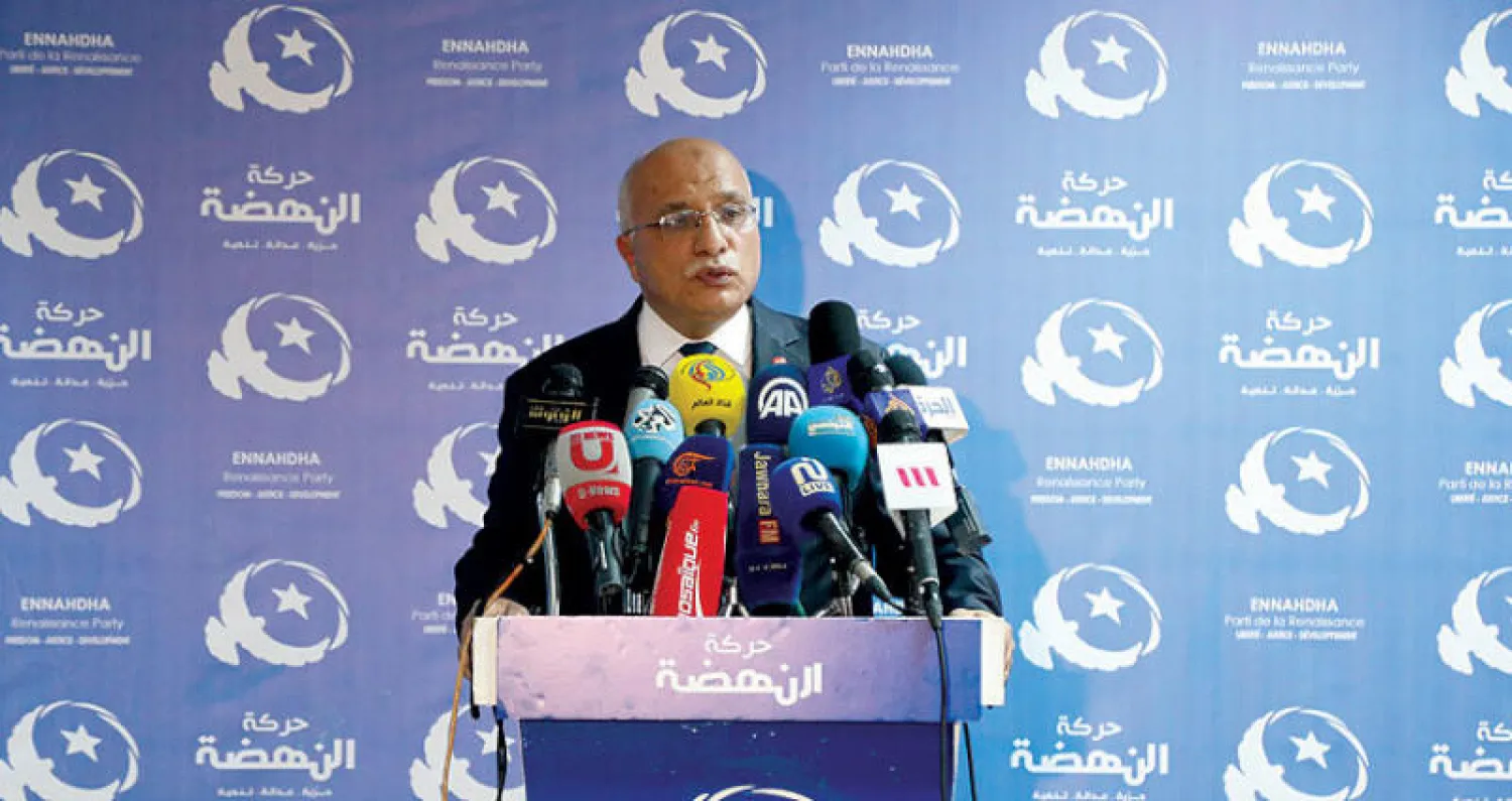 الهاروني متحدثاً خلال مؤتمر صحافي في تونس أمس (حساب النهضة على فيسبوك)