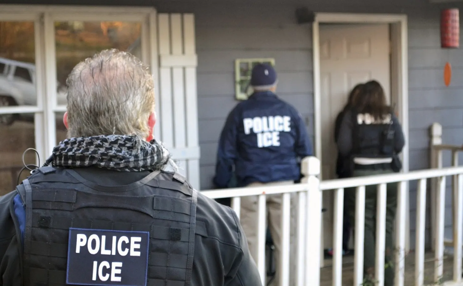 US Immigration and Customs Enforcement, ICE agents at a home in Atlanta, Georgia. (AP)