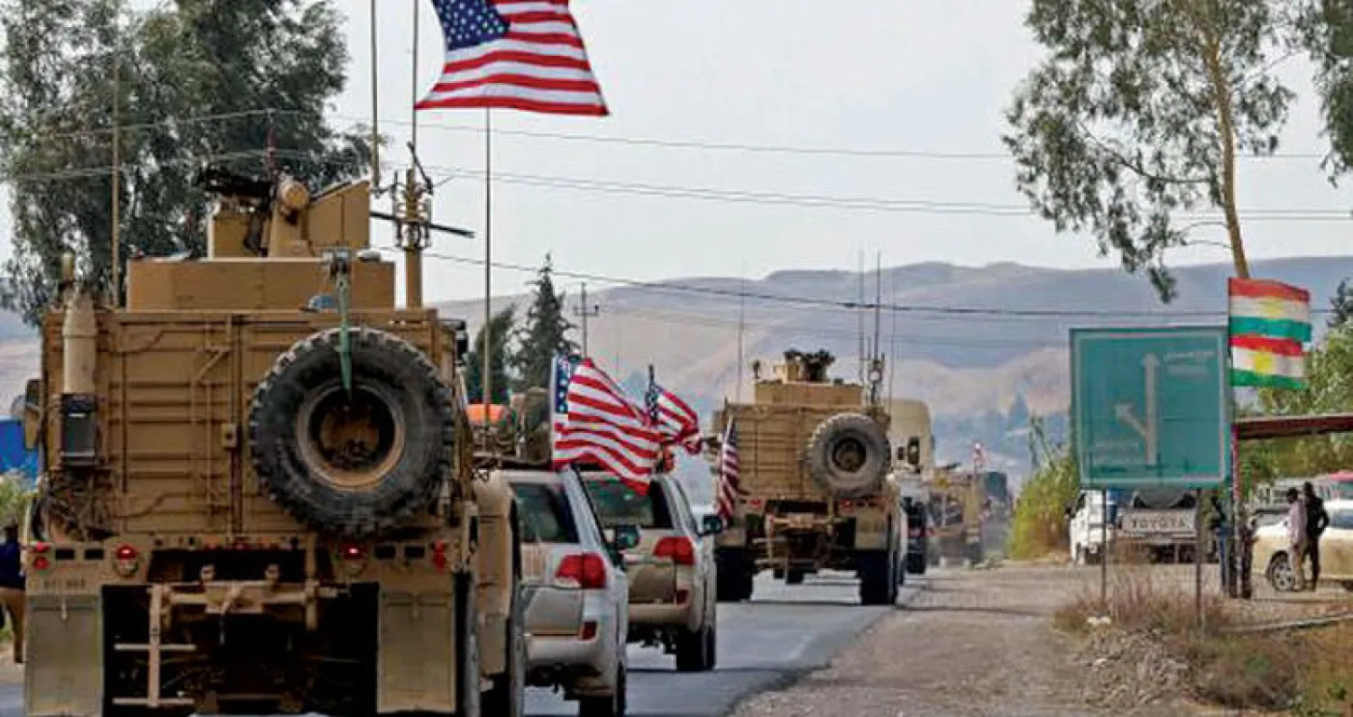 رتل عسكري أميركي منسحب من سوريا  بعد دخوله إقليم كردستان العراق أمس (أ.ف.ب)