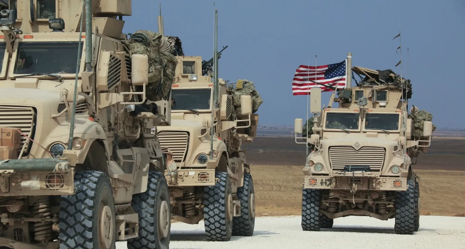 An American military convoy stops near the town of Tel Tamr, north Syria, Sunday, Oct. 20, 2019. (AP)