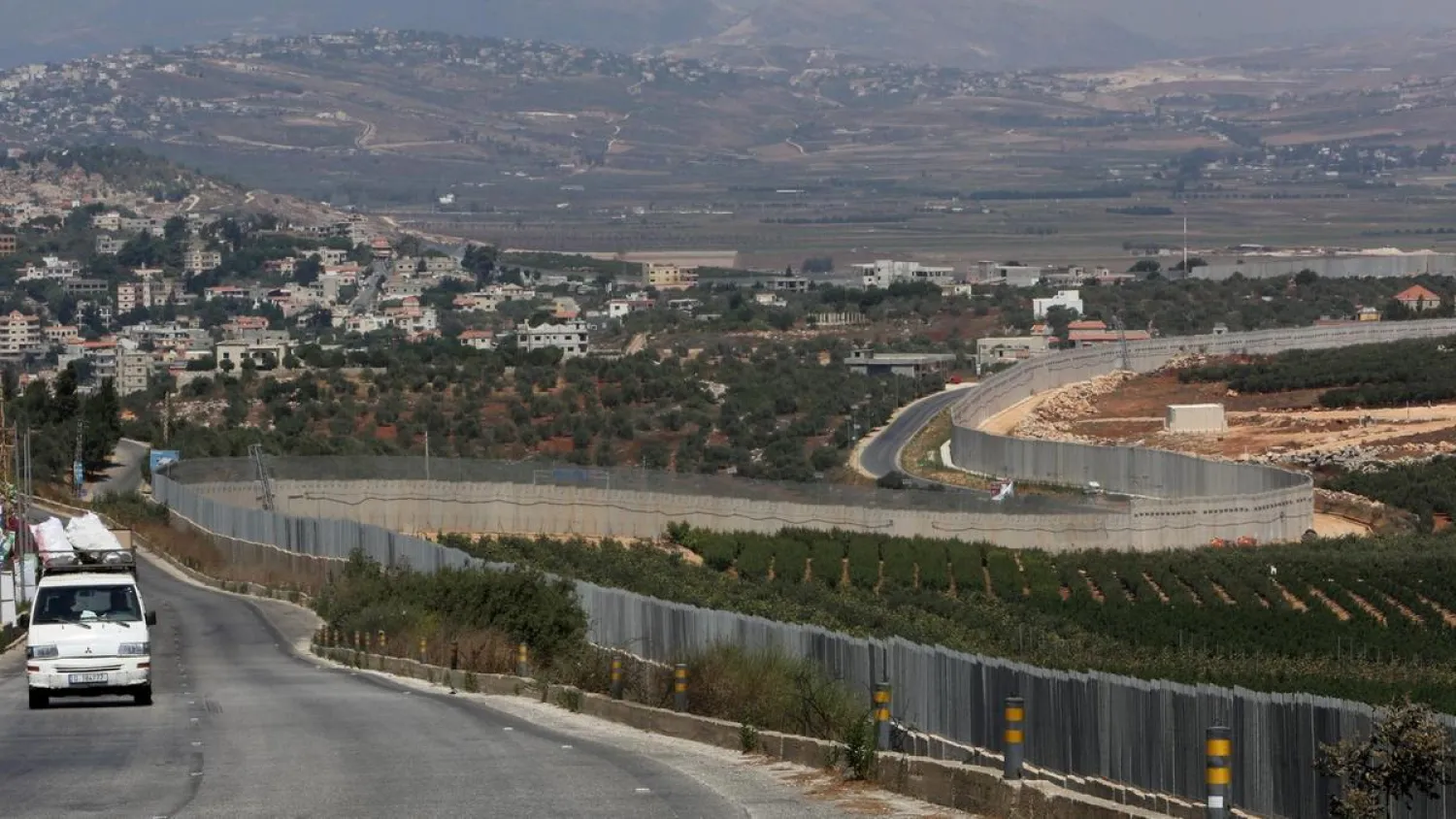 A vehicle drives in Adaisseh village near the Lebanese-Israeli border, Lebanon. (Reuters)