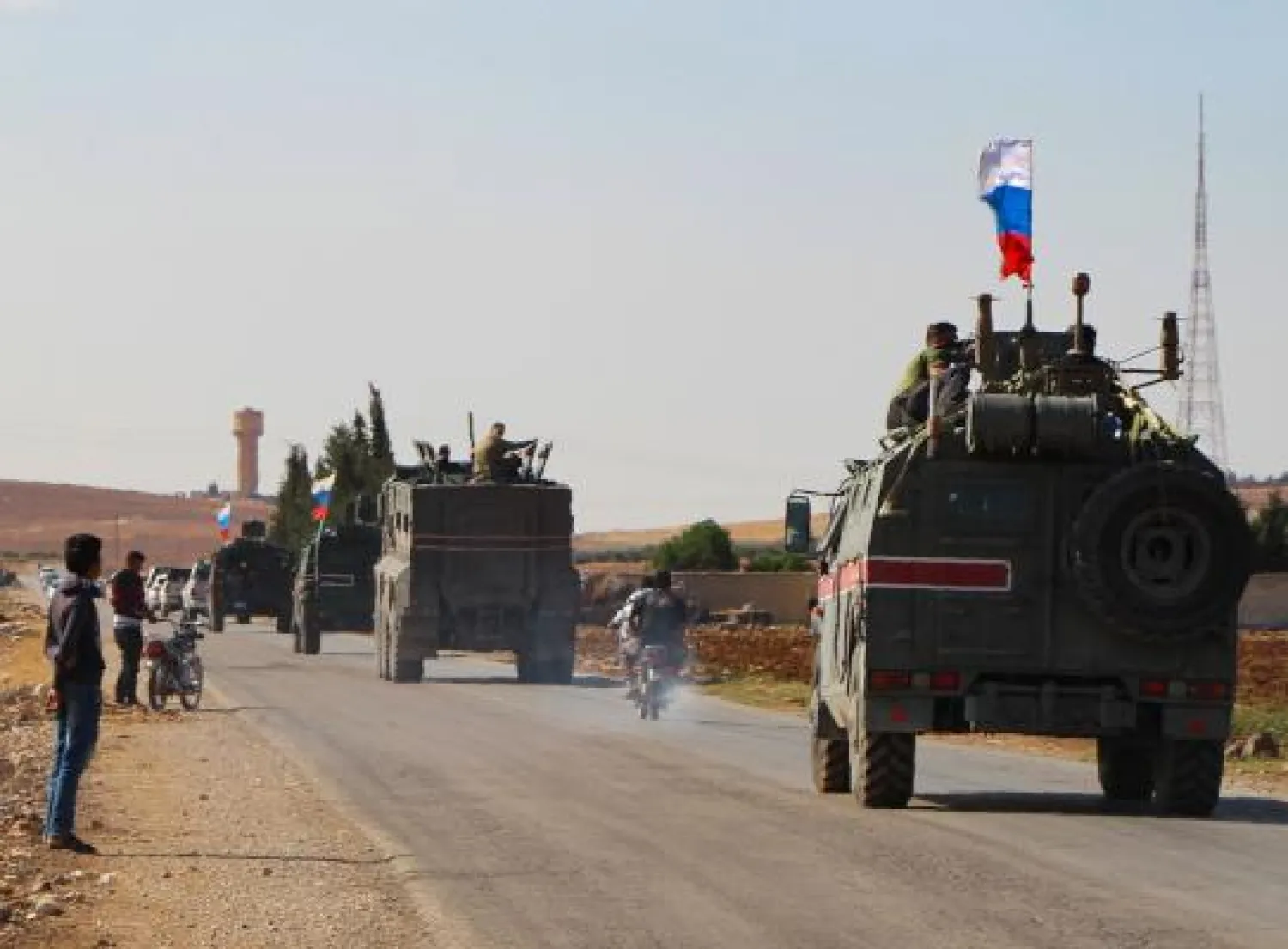A convoy of Russian military vehicles drives toward the northeastern Syrian city of Kobane on October 23, 2019. AFP