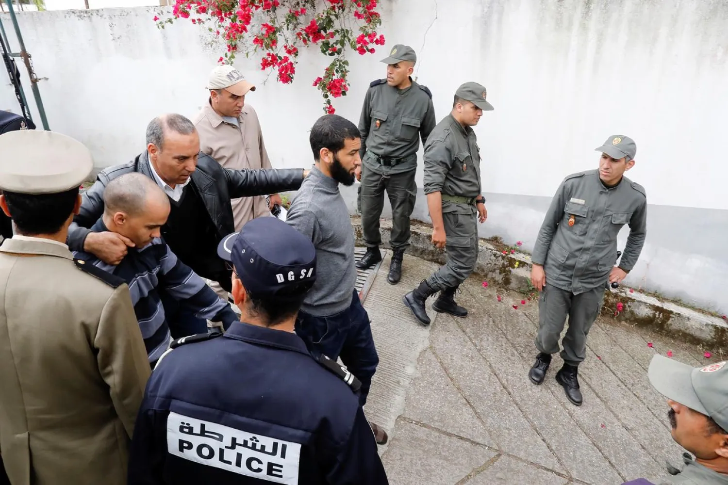 Defendants who are on trial for the killing of Scandinavian tourists Louisa Vesterager Jespersen and Maren Ueland arrive at a criminal court in Sale, Morocco May 2, 2019. REUTERS/Stringer
