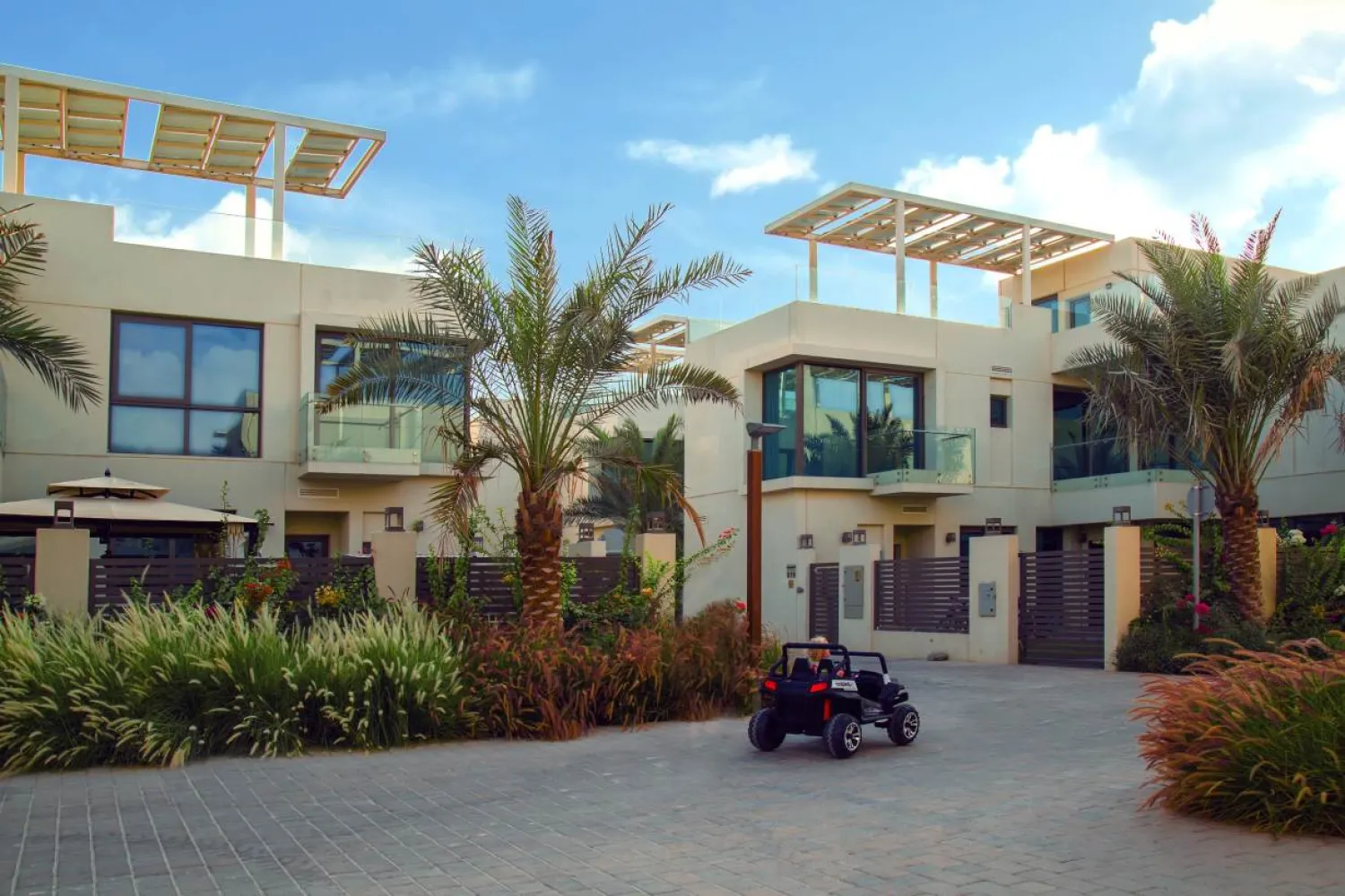 A child plays outside a villa in The Sustainable City development in Dubai in this undated photo. (Diamond Developers)