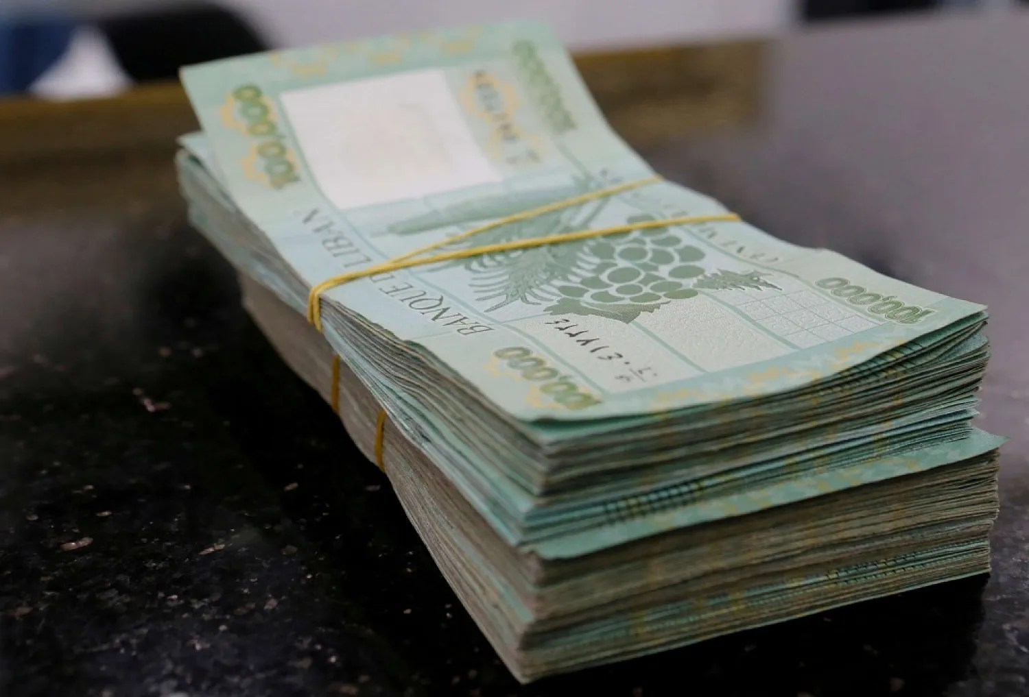 Lebanese pound banknotes on display at a money exchange shop in Beirut. (Reuters)