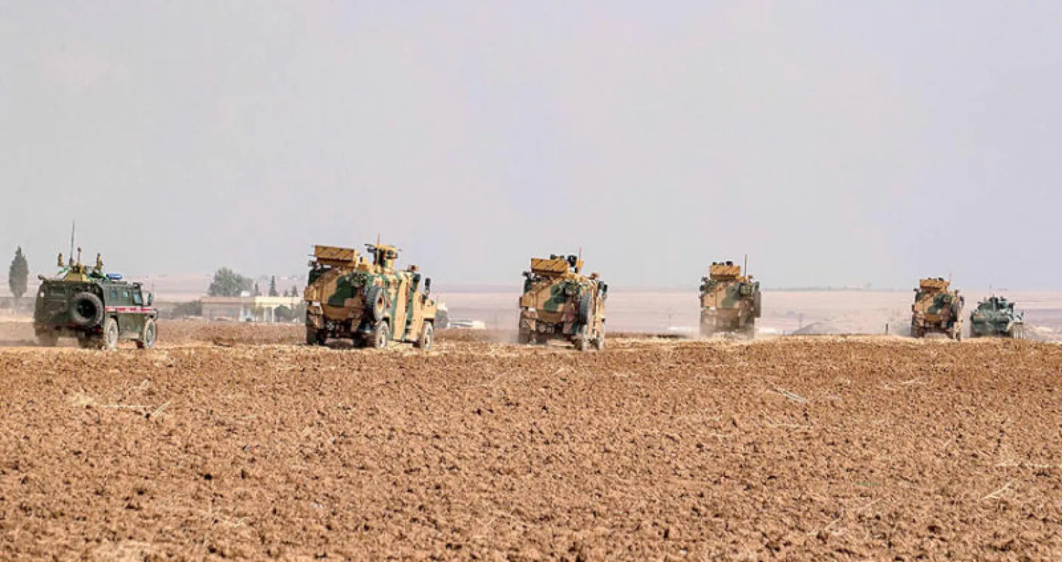 دورية روسية ــ تركية قرب الدرباسية شمال شرقي سوريا أمس (أ.ف.ب)